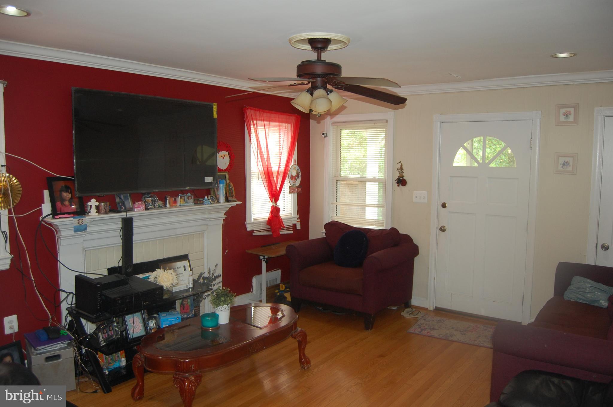 10409 Amherst Avenue Silver Spring, MD 20902 - Photo 8 of 47 Family Room With Fireplace