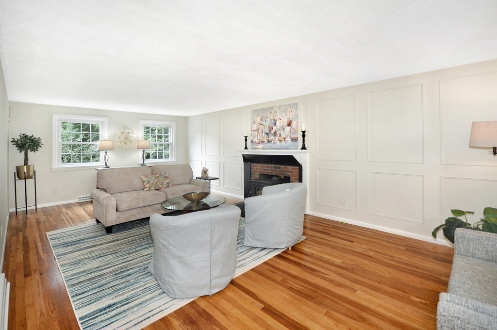 30 Chester Road Boxborough, MA 01719 - Photo 23 of 38 a living room with furniture and a fireplace