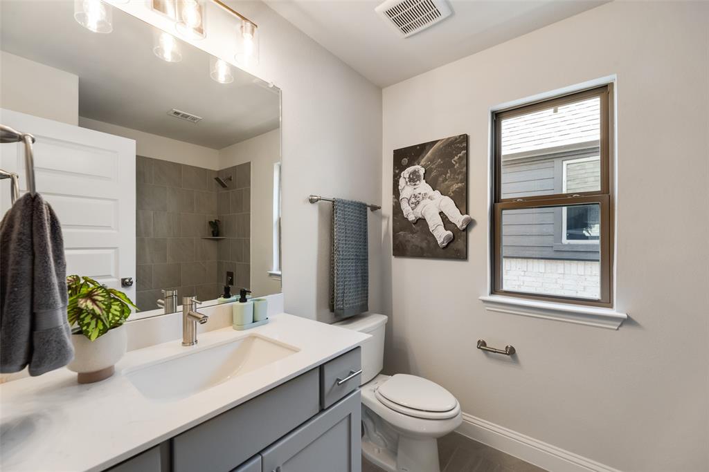 5216 Picasso Road Royse City, TX 75189 - Photo 20 of 25 a bathroom with a sink a toilet and shower