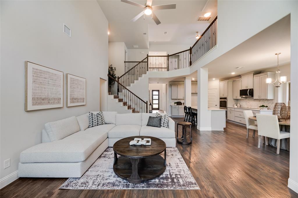 5216 Picasso Road Royse City, TX 75189 - Photo 6 of 25 a living room with furniture and wooden floor