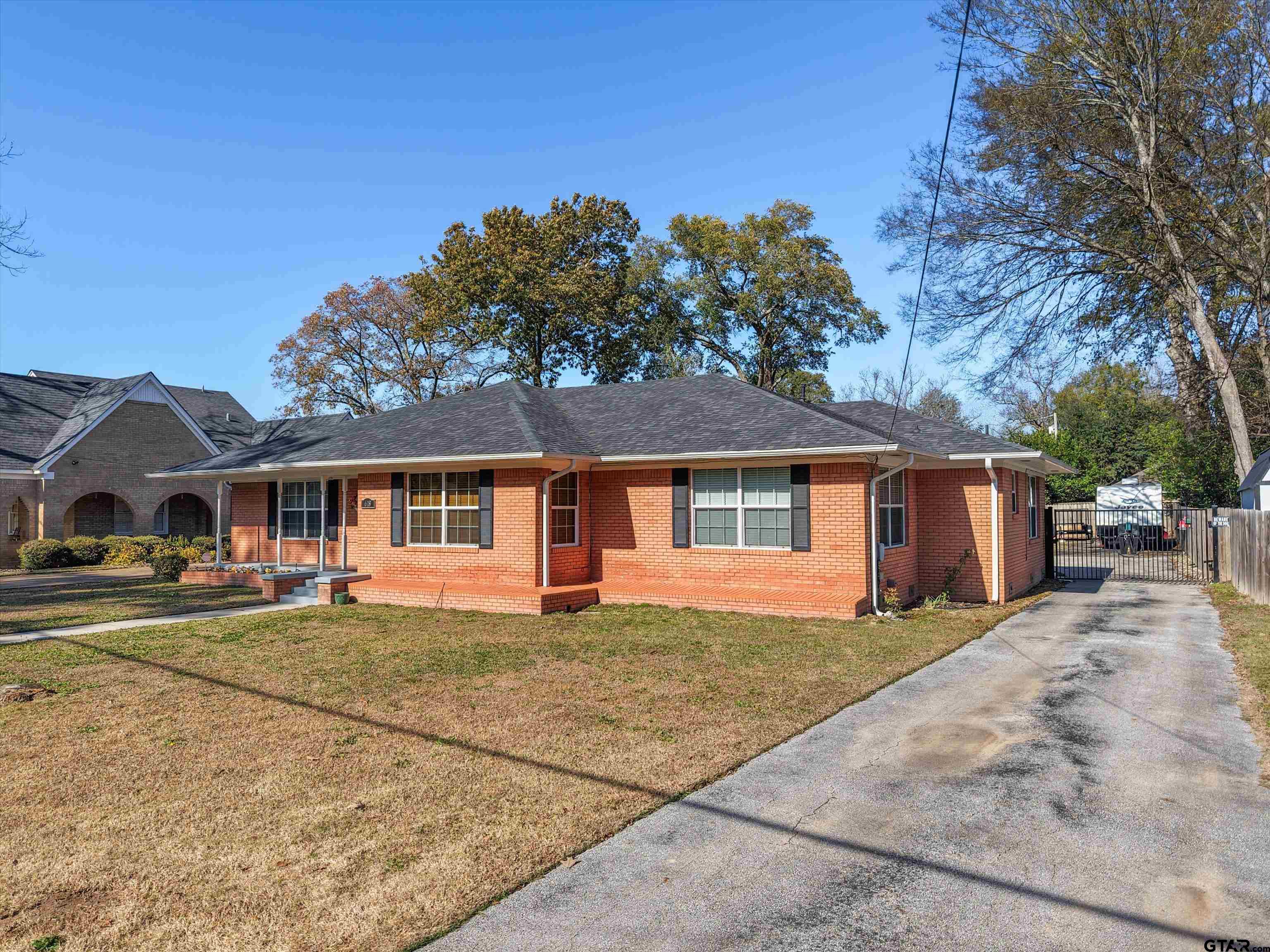 618 Walnut Street Gilmer, TX 75644 - Photo 2 of 30 front view of a house with a yard