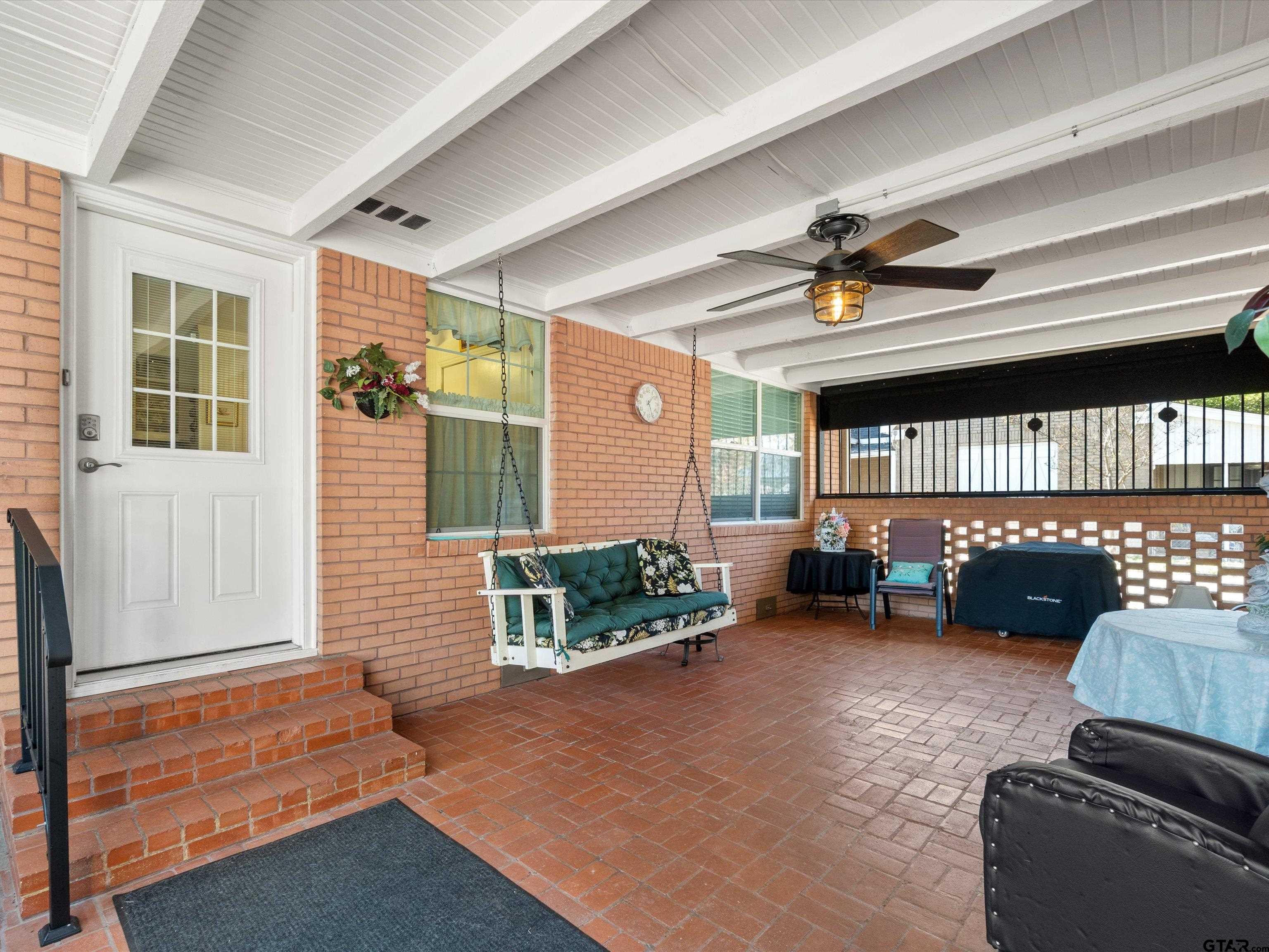618 Walnut Street Gilmer, TX 75644 - Photo 26 of 30 a living room with furniture and a window