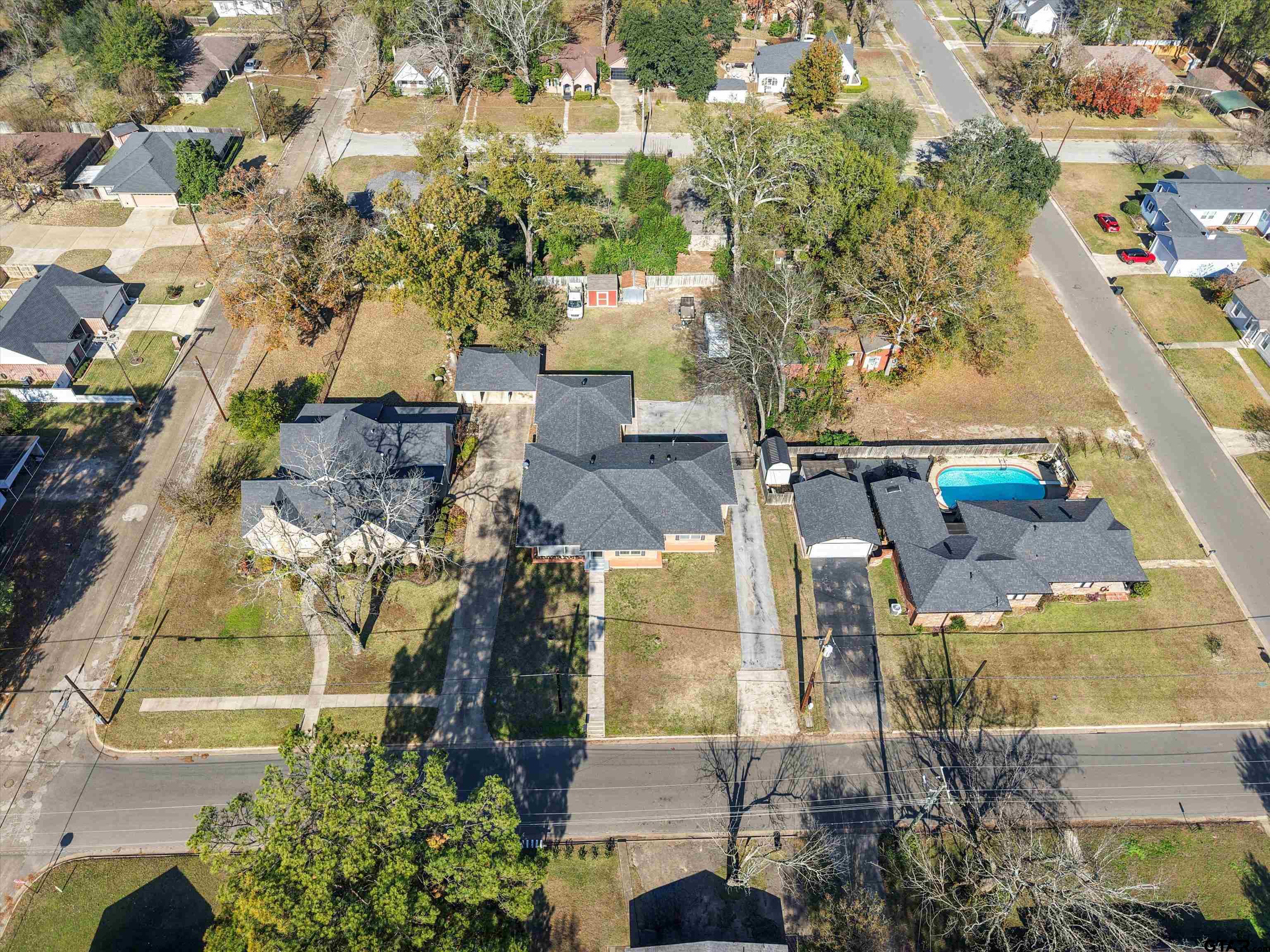 618 Walnut Street Gilmer, TX 75644 - Photo 6 of 30 an aerial view of residential houses with outdoor space