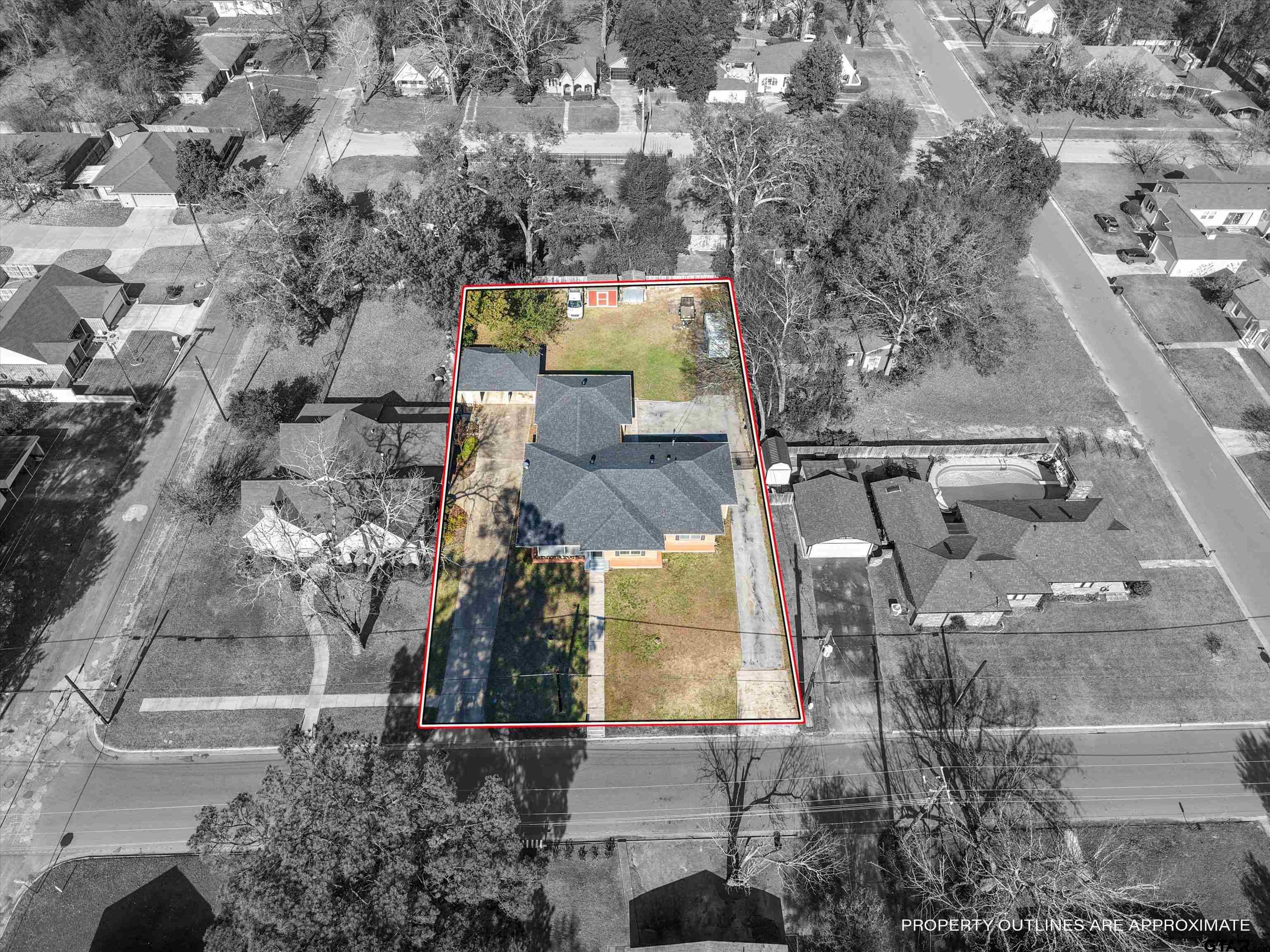 618 Walnut Street Gilmer, TX 75644 - Photo 7 of 30 an aerial view of residential houses with outdoor space