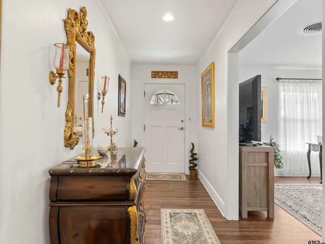 a room with furniture and wooden floor