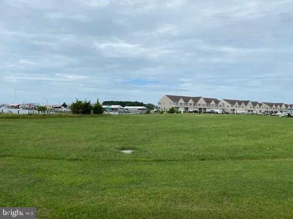 a view of a field with clear sky