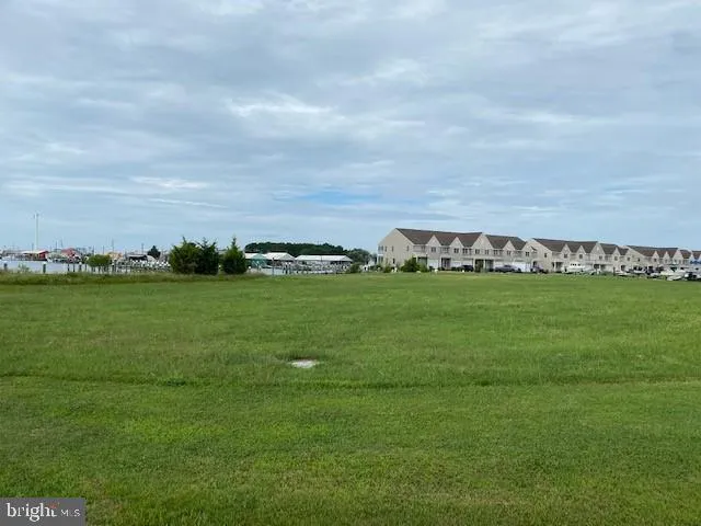 a view of a field with clear sky