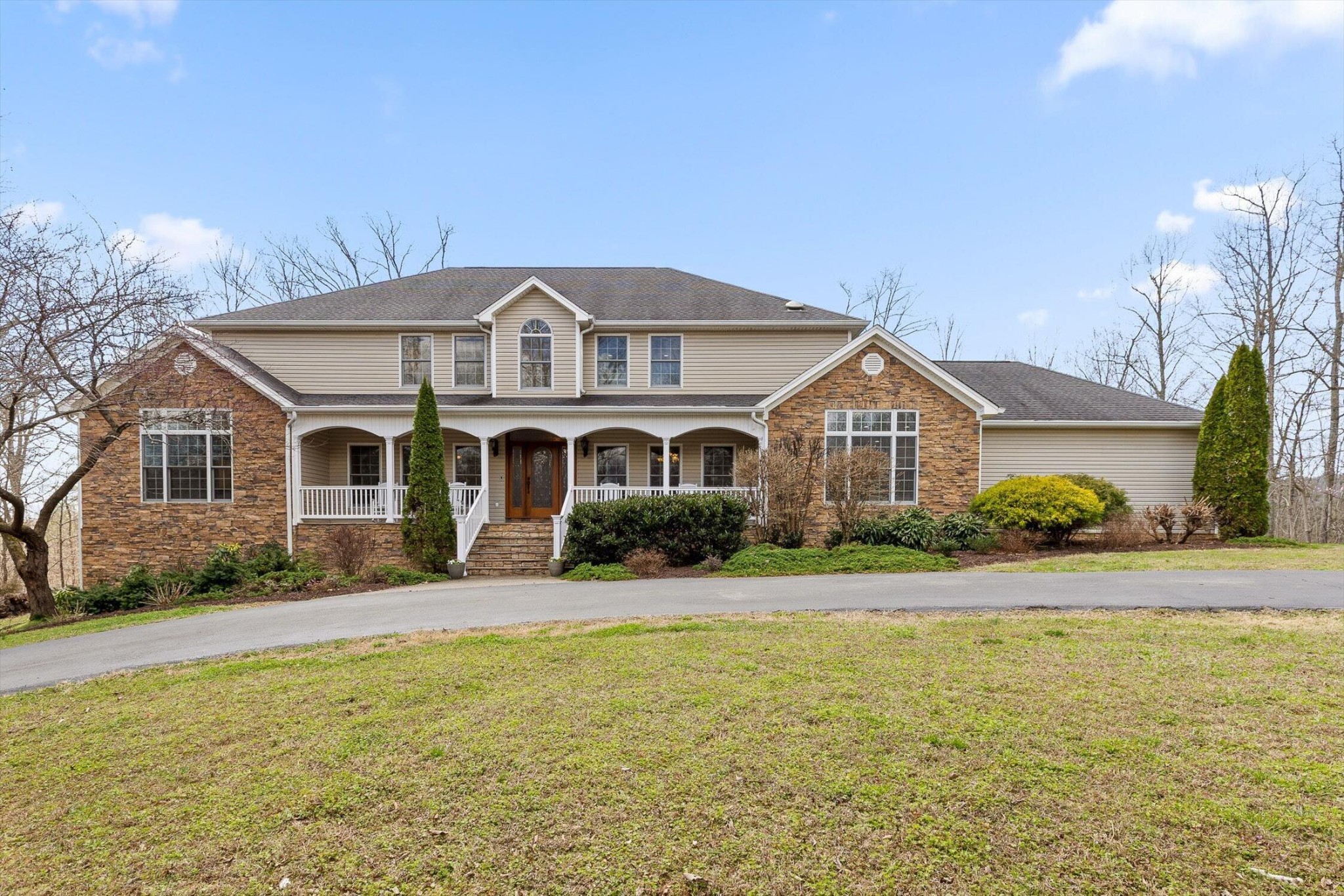 1250 Owl Hollow Road McDonald, TN 37353 - Photo 2 of 87 a front view of a house with a yard