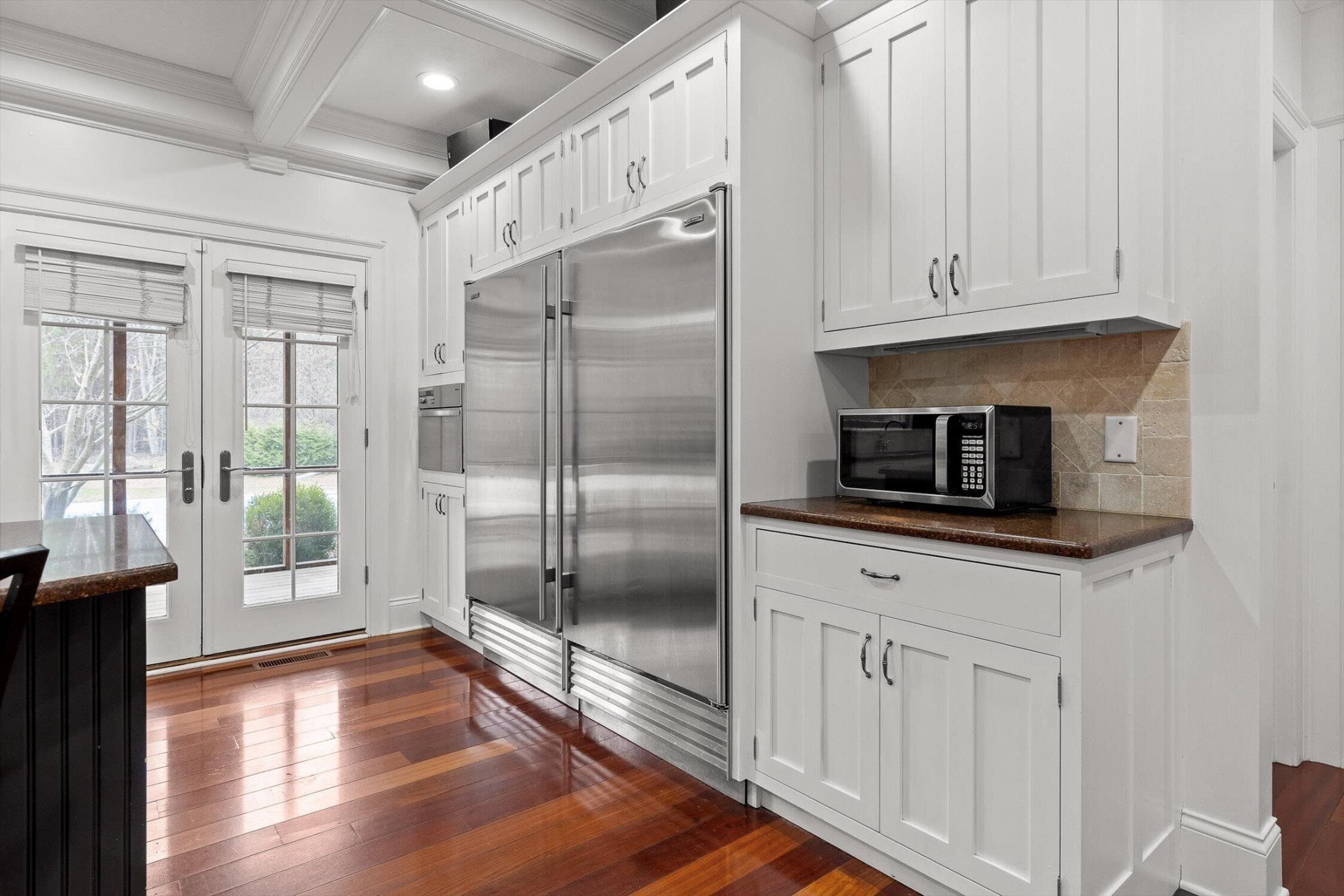 1250 Owl Hollow Road McDonald, TN 37353 - Photo 21 of 87 a kitchen with granite countertop a refrigerator a sink and white cabinets