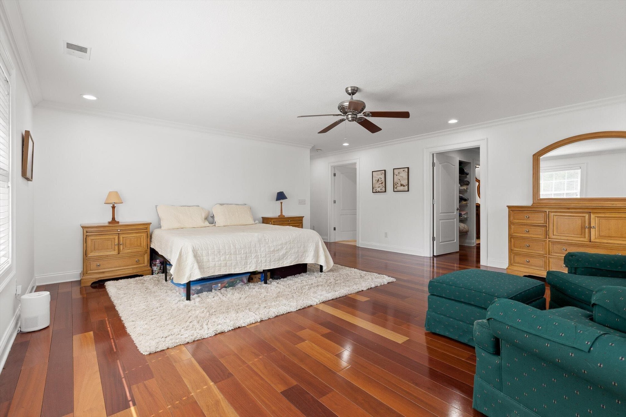 1250 Owl Hollow Road McDonald, TN 37353 - Photo 36 of 87 a spacious bedroom with a bed a couch and a dresser