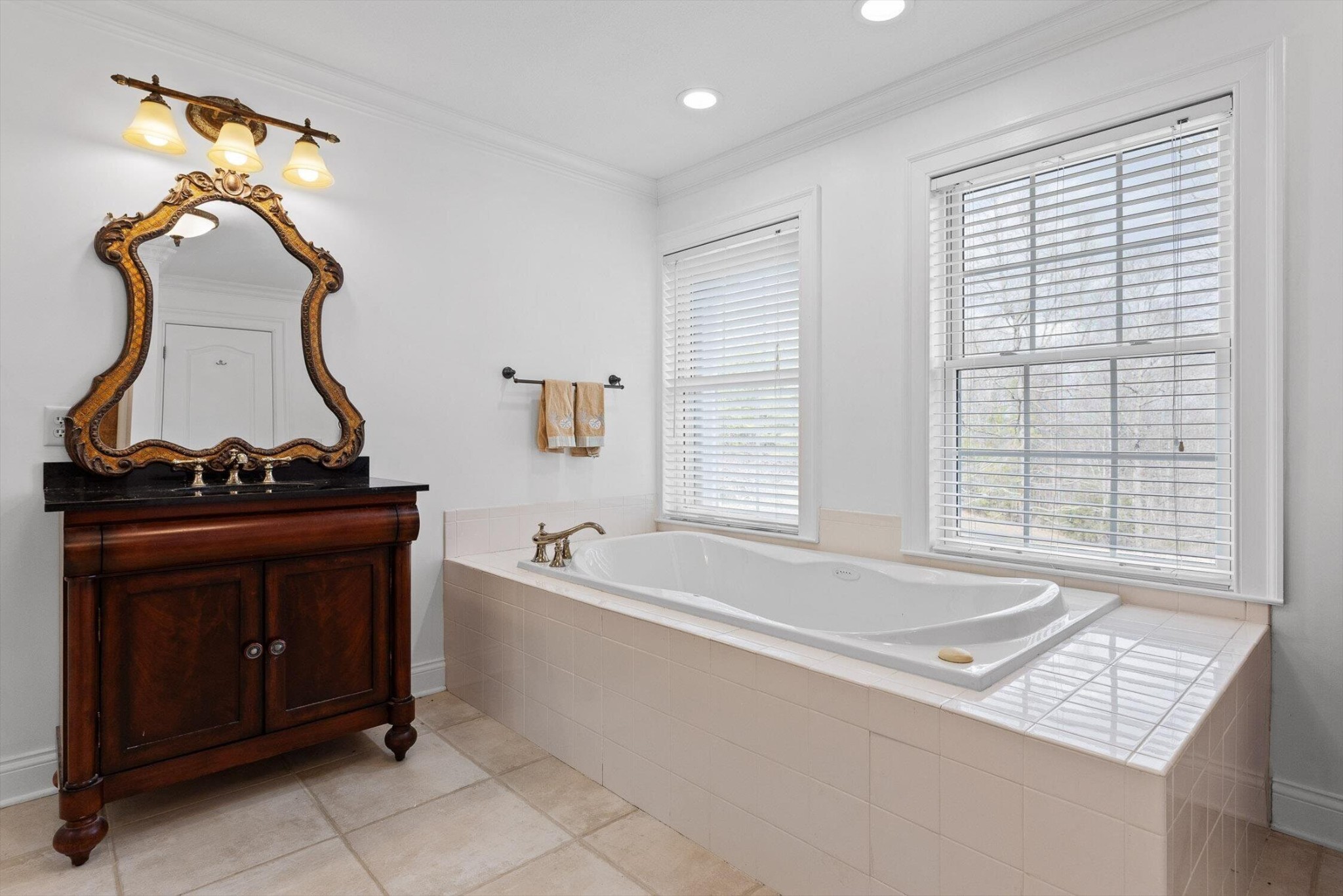1250 Owl Hollow Road McDonald, TN 37353 - Photo 38 of 87 a bath room with a bath tub and a chair