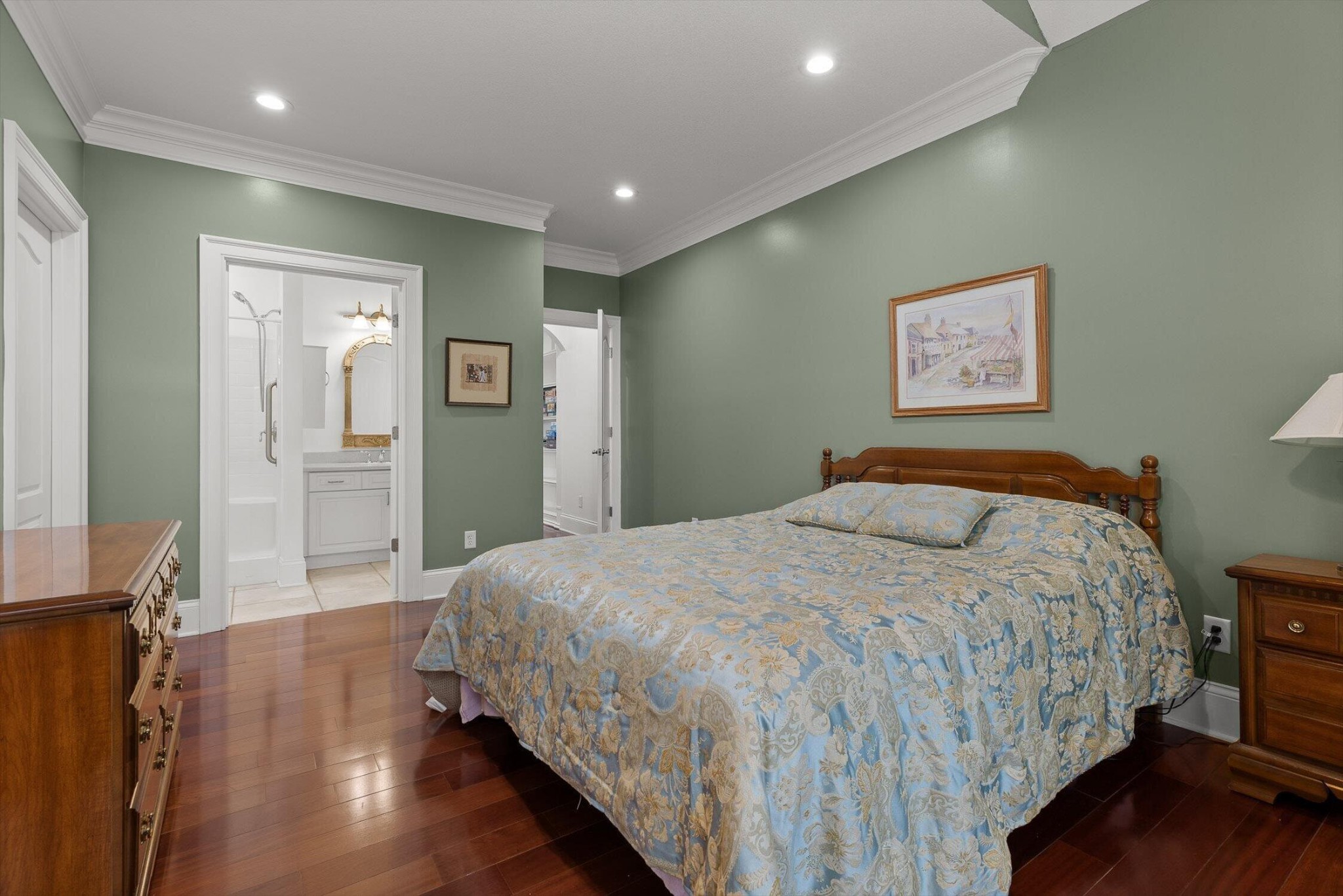 1250 Owl Hollow Road McDonald, TN 37353 - Photo 57 of 87 a bedroom with a large bed and a wooden floor
