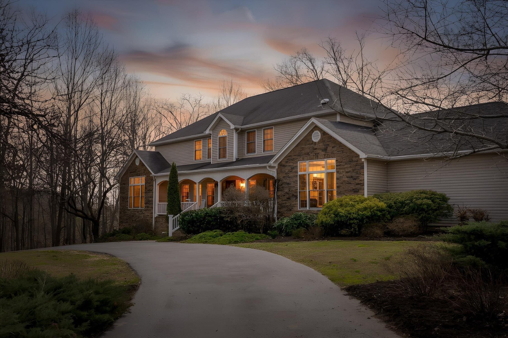 1250 Owl Hollow Road McDonald, TN 37353 - Photo 61 of 87 a front view of a house with a yard and garage
