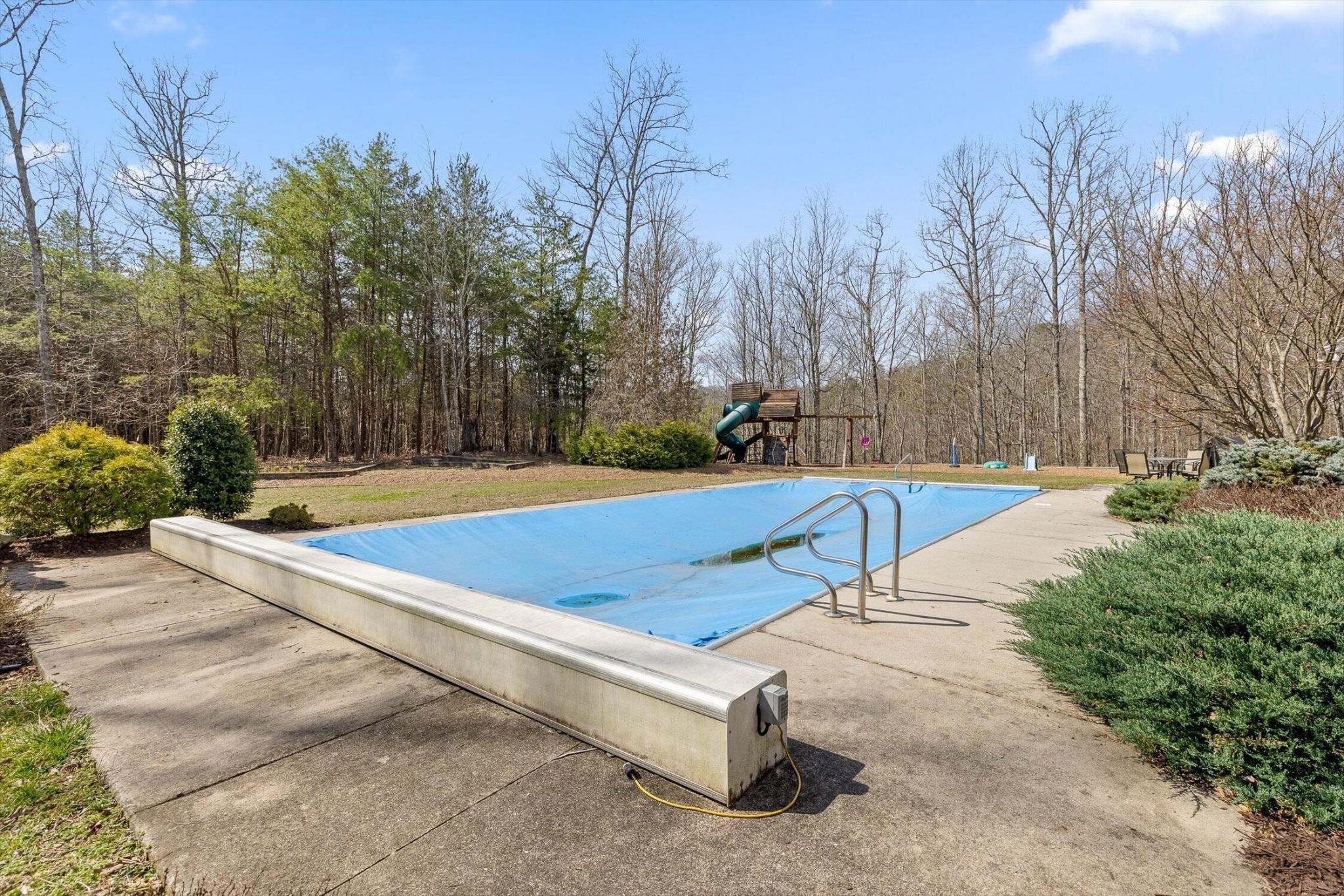 1250 Owl Hollow Road McDonald, TN 37353 - Photo 68 of 87 a view of a tennis ground with large trees