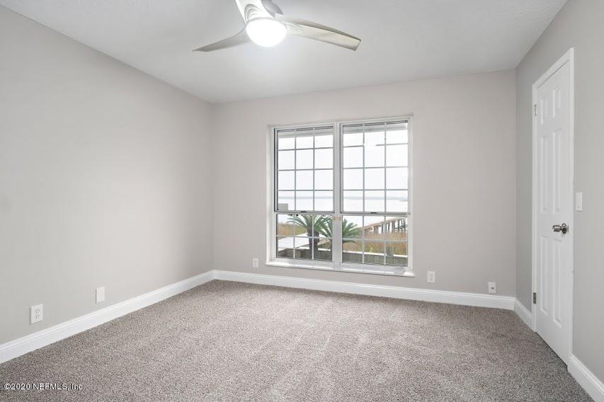4283 Heath Road Jacksonville, FL 32277 - Photo 18 of 30 an empty room with a window