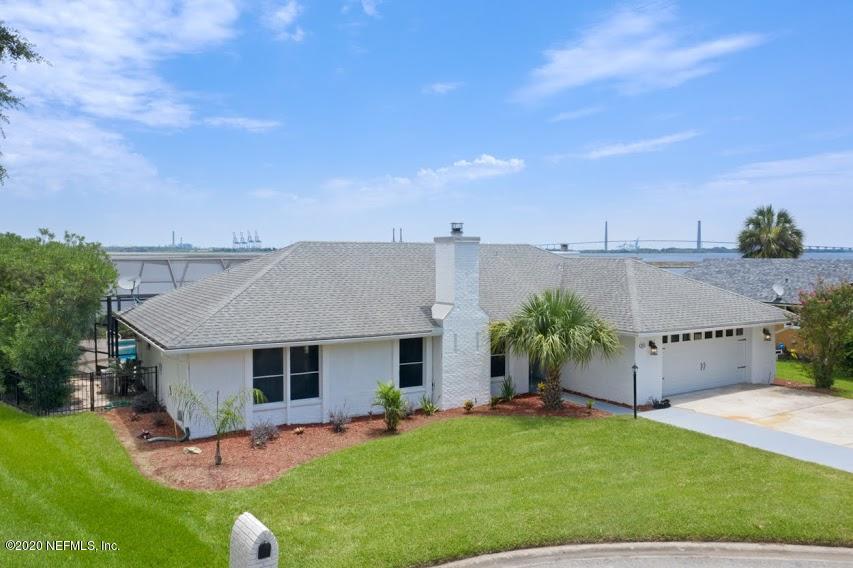 4283 Heath Road Jacksonville, FL 32277 - Photo 2 of 30 a view of a house with backyard and sitting area