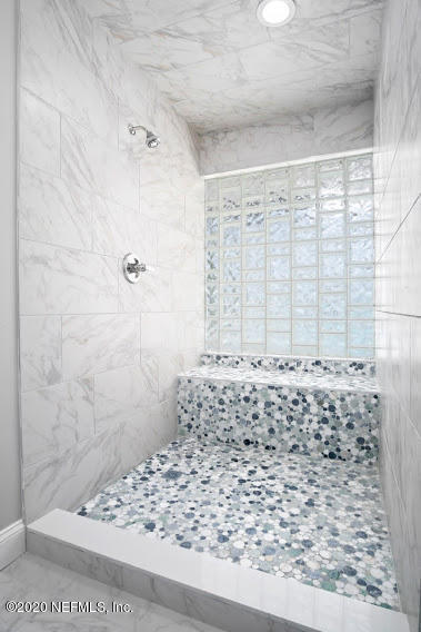 4283 Heath Road Jacksonville, FL 32277 - Photo 24 of 30 a bathroom with a shower