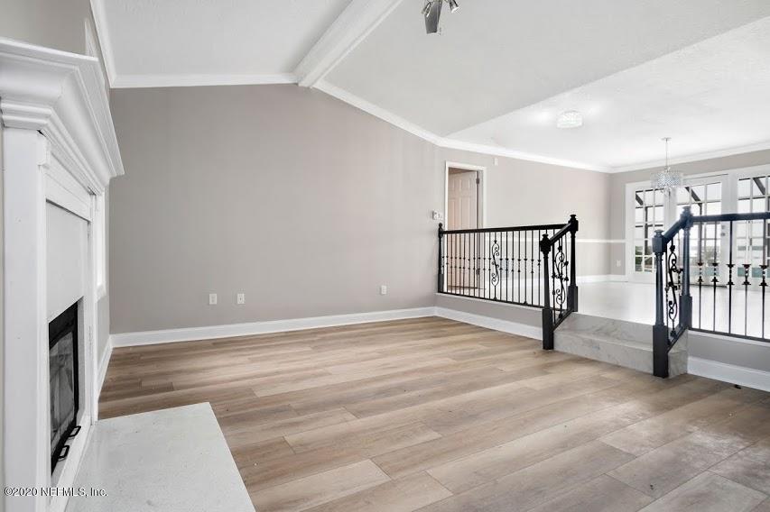 4283 Heath Road Jacksonville, FL 32277 - Photo 5 of 30 a view of an empty room with stairs