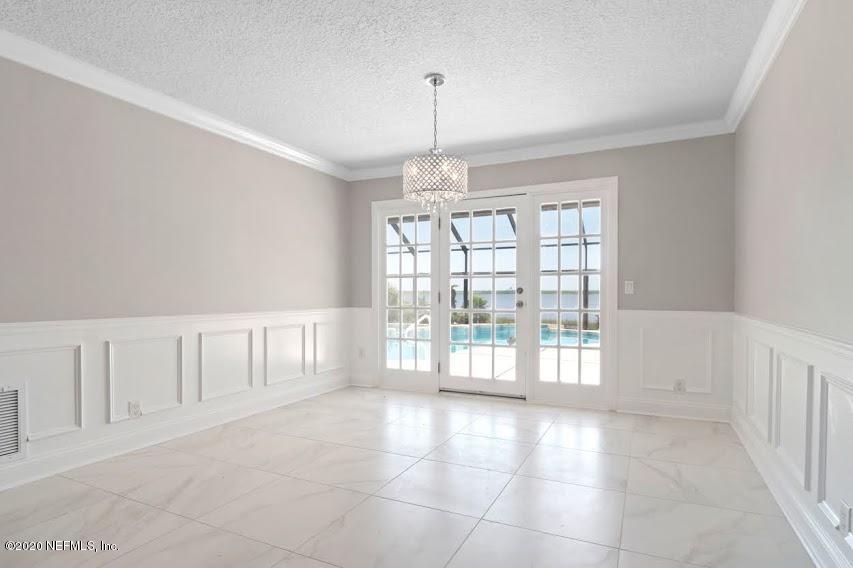 4283 Heath Road Jacksonville, FL 32277 - Photo 8 of 30 a view of an empty room with a window