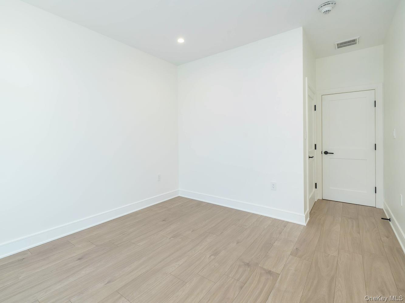 24 Lumber Road, Unit 1 Roslyn, NY 11576 - Photo 11 of 18 a view of an empty room