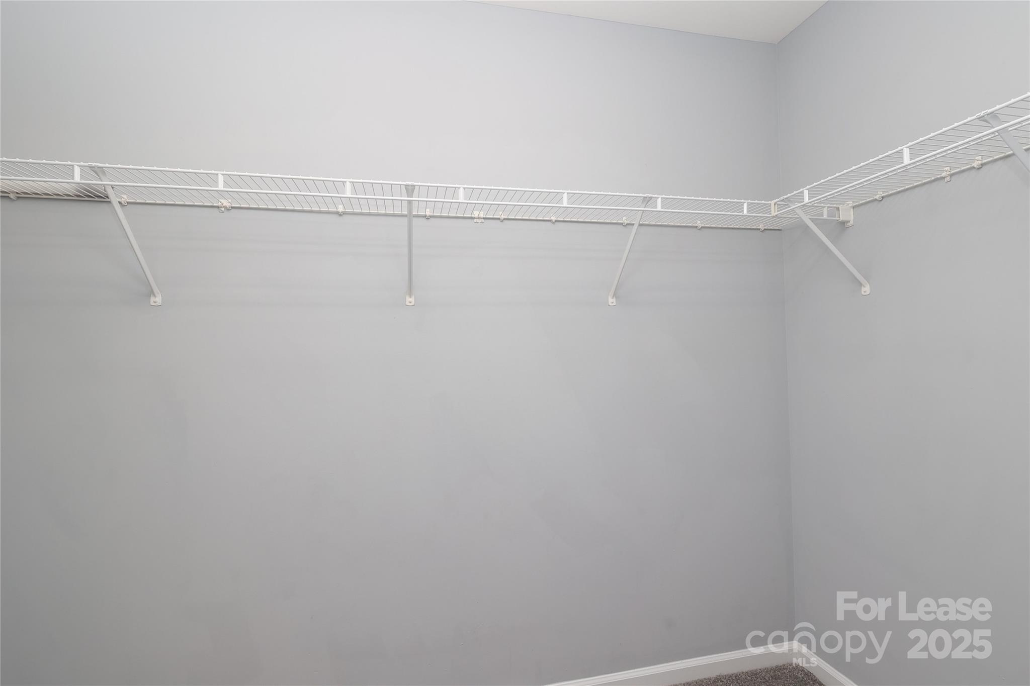 4112 Chatterleigh Drive Monroe, NC 28110 - Photo 26 of 43 a view of a room with racks on the wall