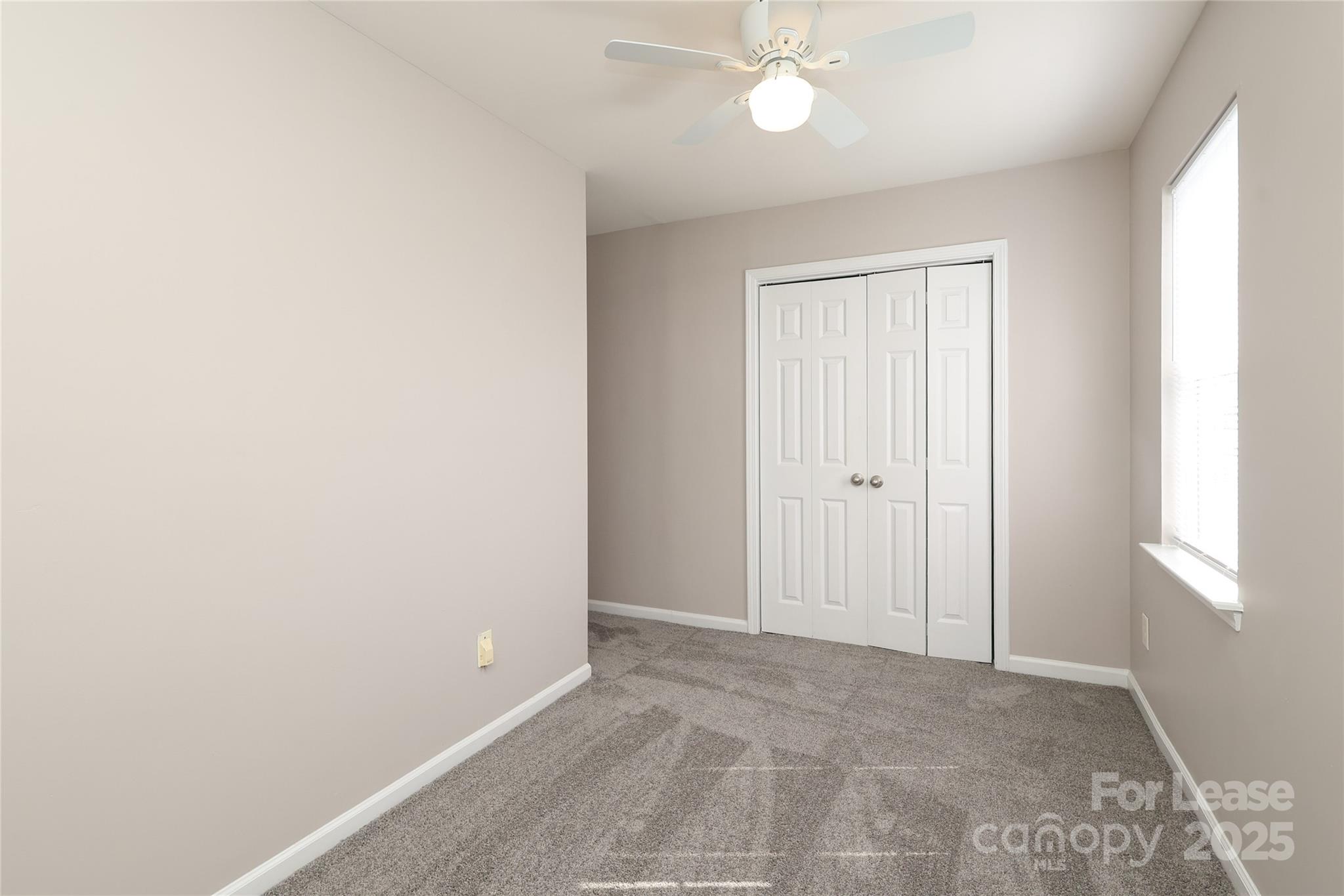 4112 Chatterleigh Drive Monroe, NC 28110 - Photo 33 of 43 a view of an empty room with a window