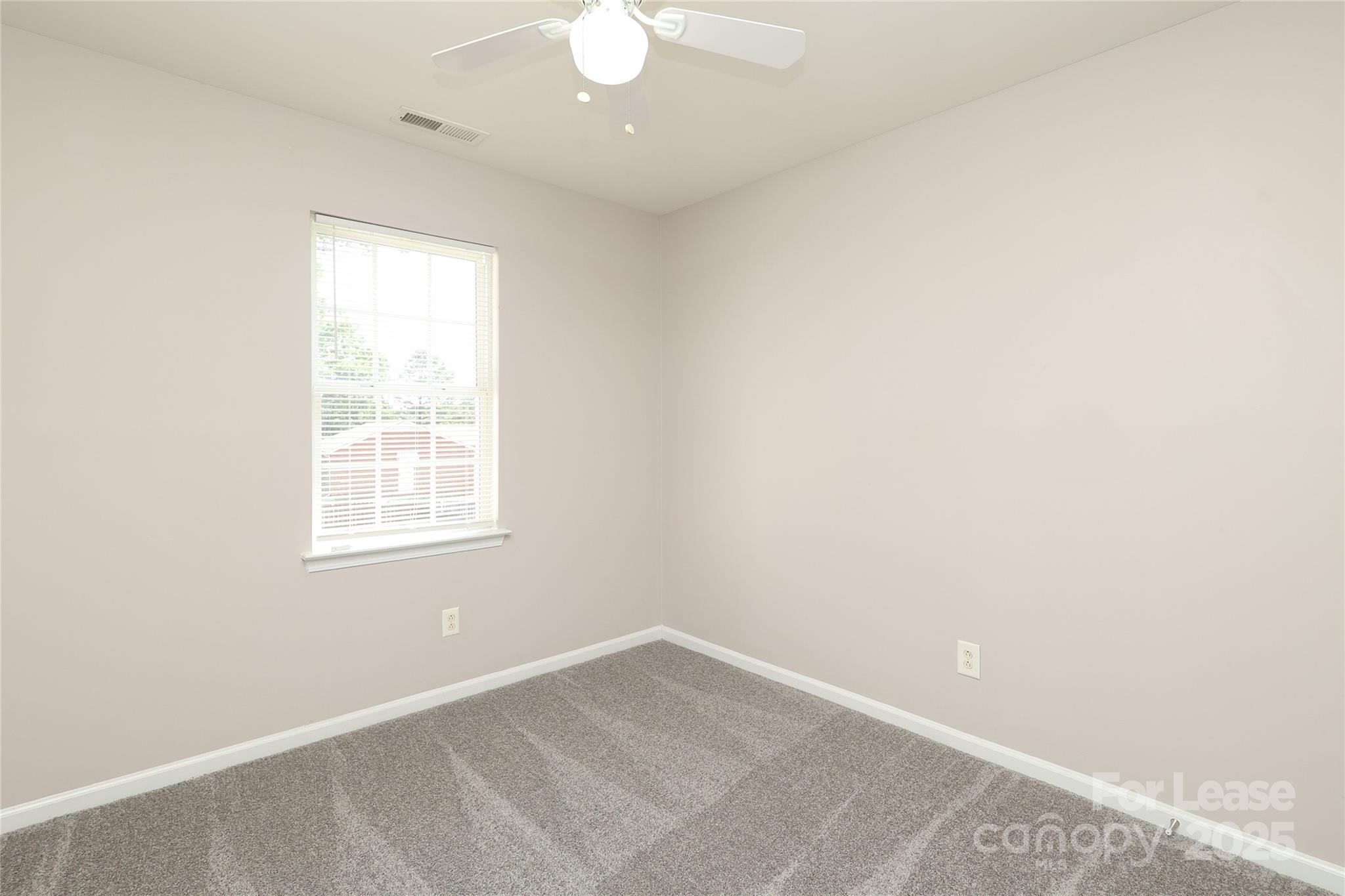 4112 Chatterleigh Drive Monroe, NC 28110 - Photo 34 of 43 an empty room with a window