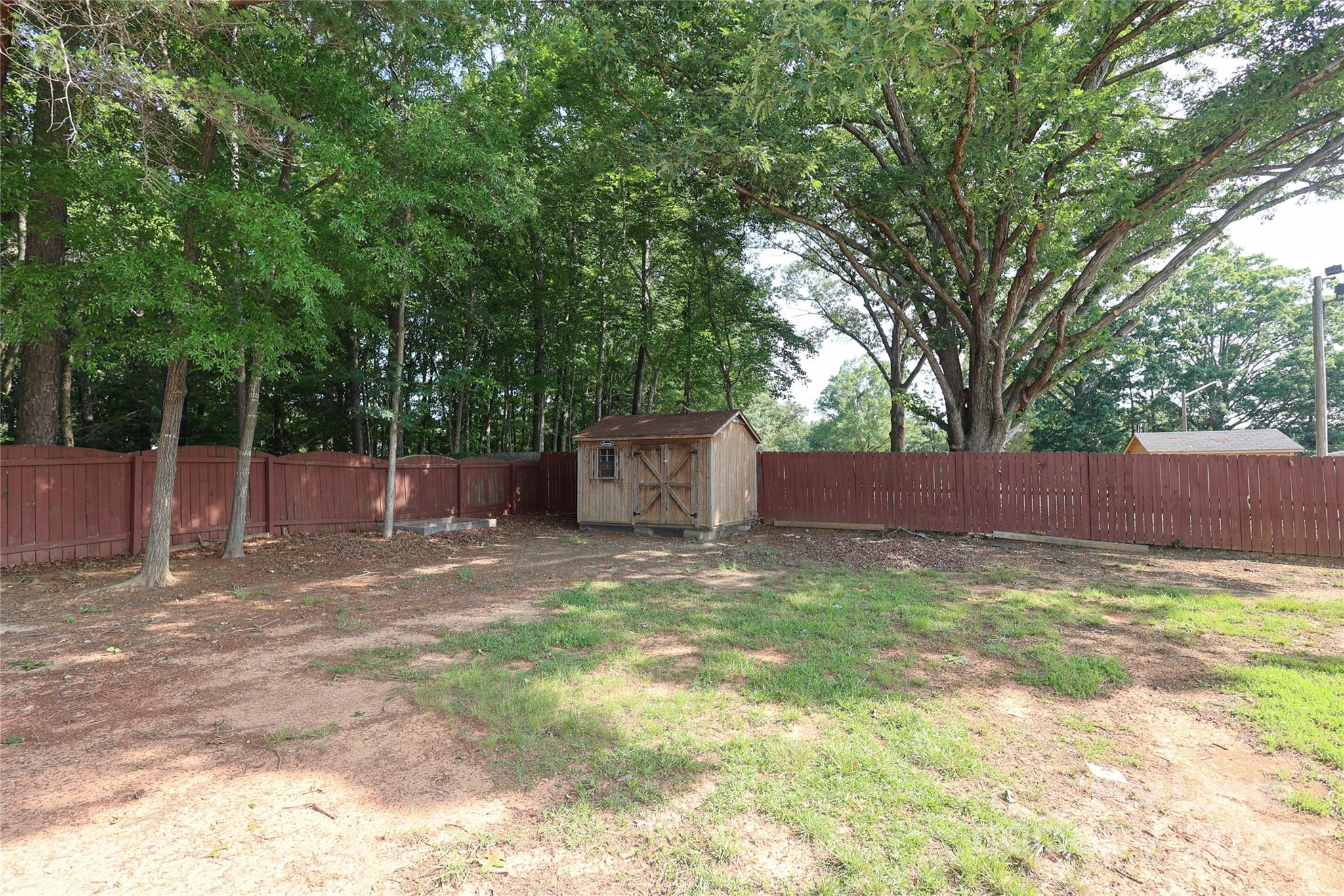 4112 Chatterleigh Drive Monroe, NC 28110 - Photo 38 of 43 a backyard of a house
