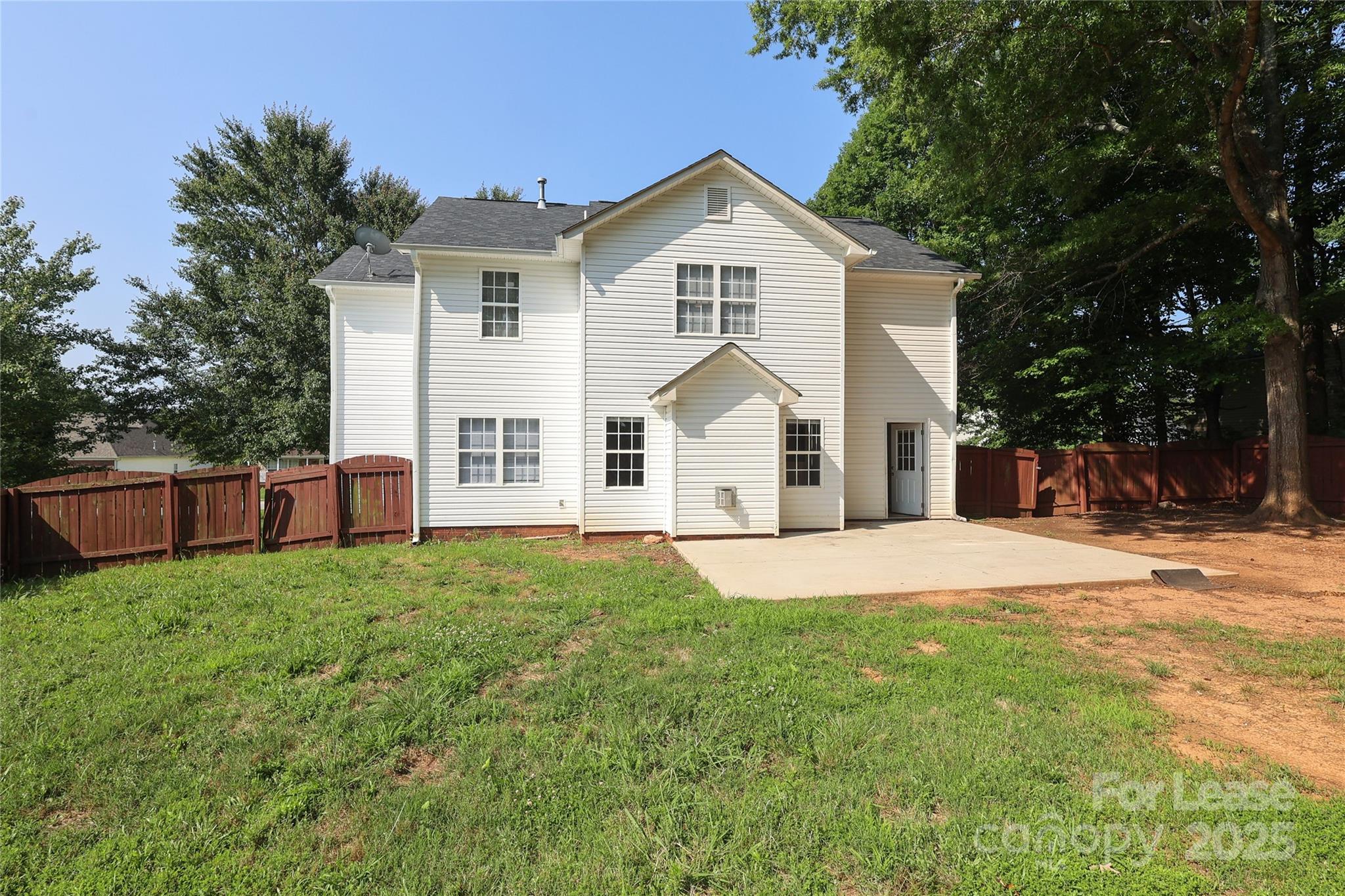 4112 Chatterleigh Drive Monroe, NC 28110 - Photo 41 of 43 a view of a yard in front of a house with large trees