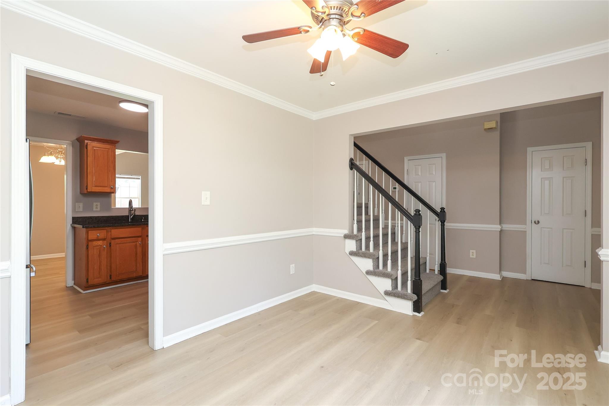 4112 Chatterleigh Drive Monroe, NC 28110 - Photo 7 of 43 a view of a hallway with wooden floor and entryway