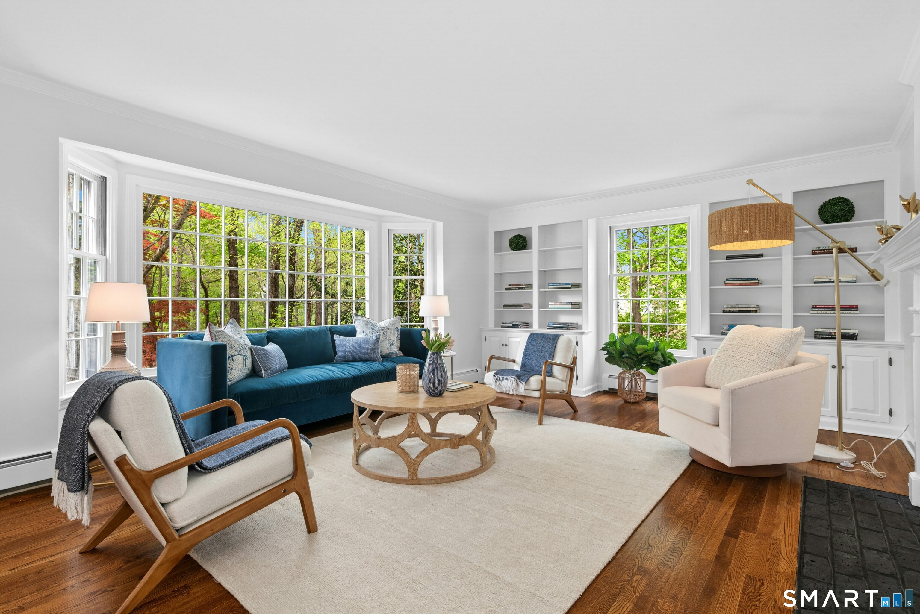 254 White Oak Shade Road New Canaan, CT 06840 - Photo 11 of 31 a living room with furniture and a large window
