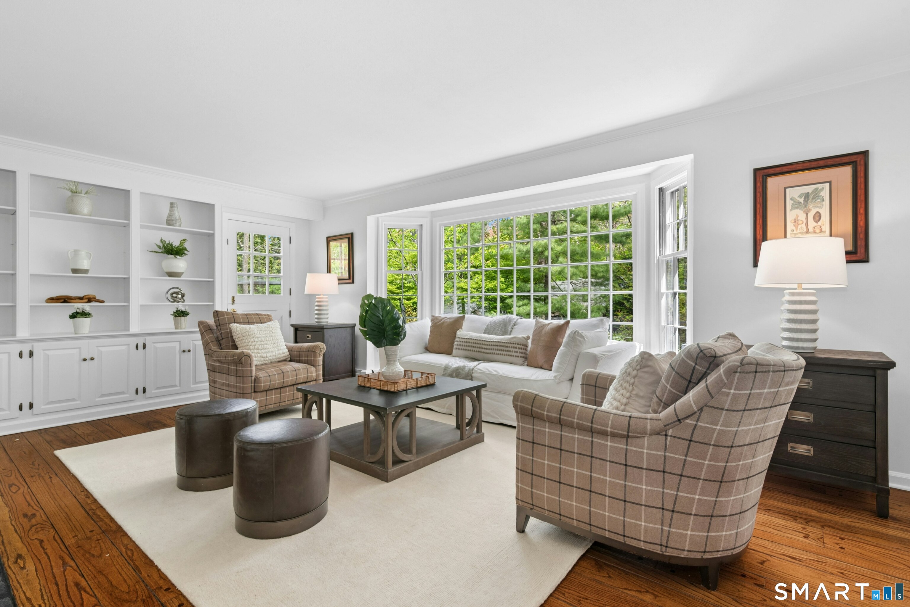 254 White Oak Shade Road New Canaan, CT 06840 - Photo 13 of 31 a living room with furniture and a large window