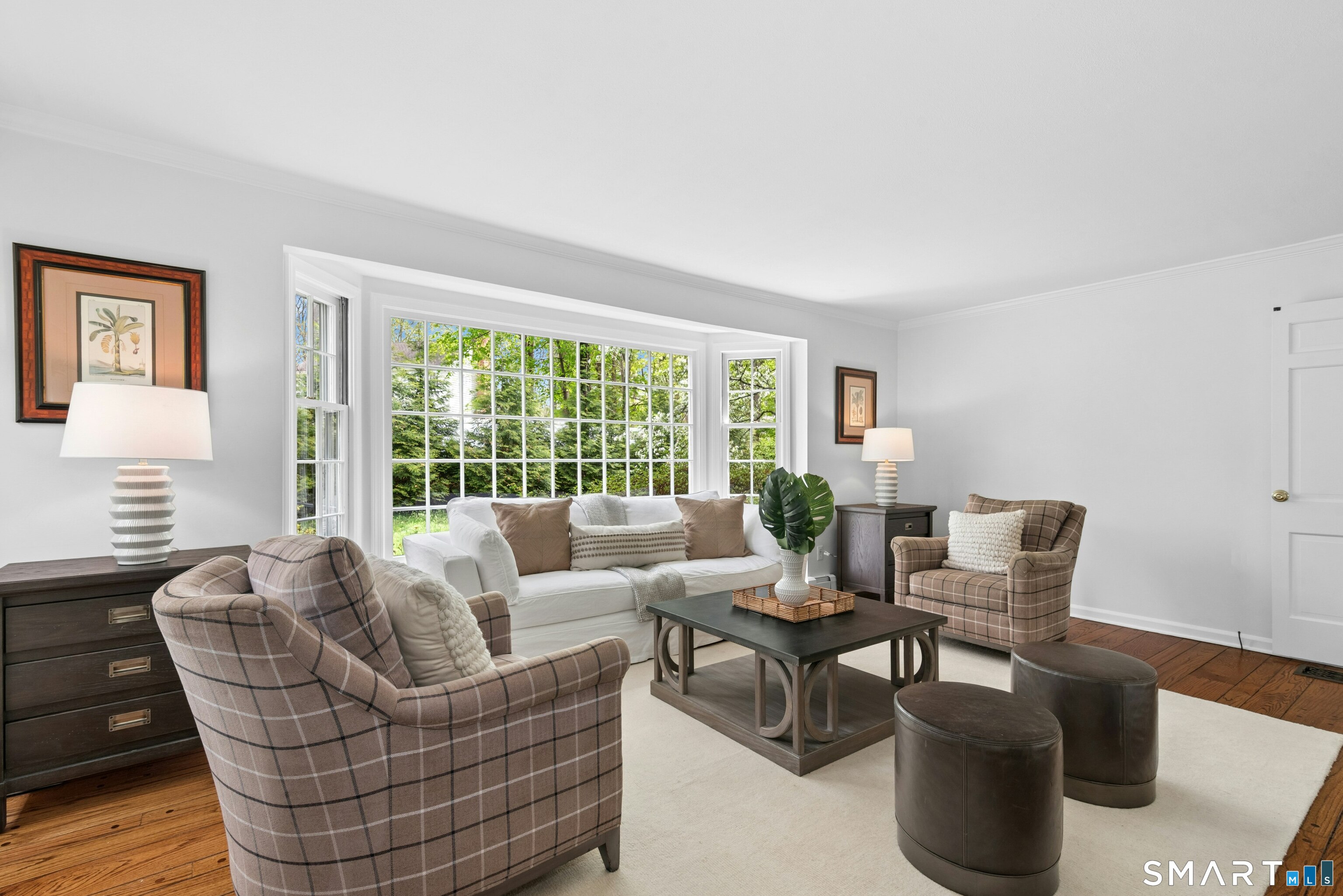 254 White Oak Shade Road New Canaan, CT 06840 - Photo 14 of 31 a living room with furniture and a large window