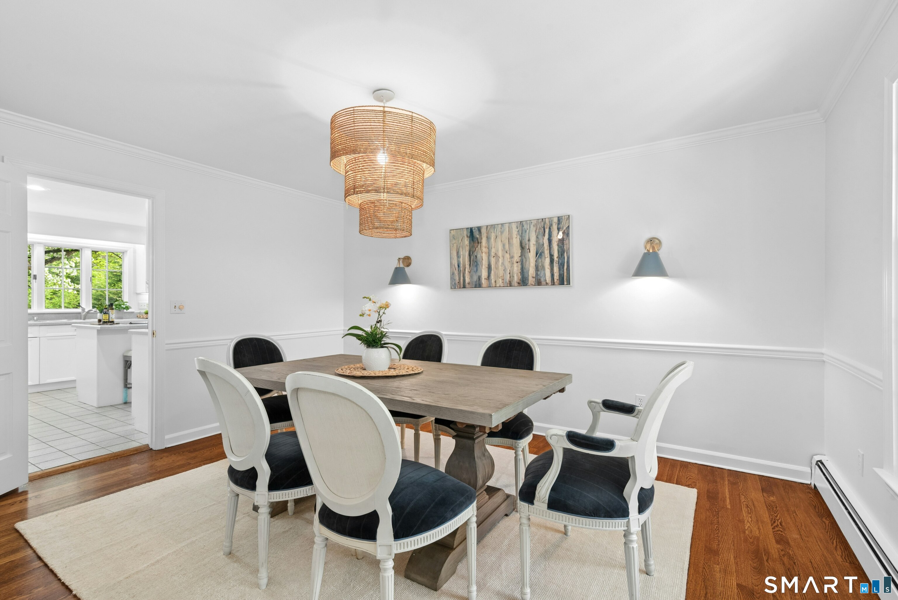 254 White Oak Shade Road New Canaan, CT 06840 - Photo 17 of 31 a view of a dining room with furniture and wooden floor
