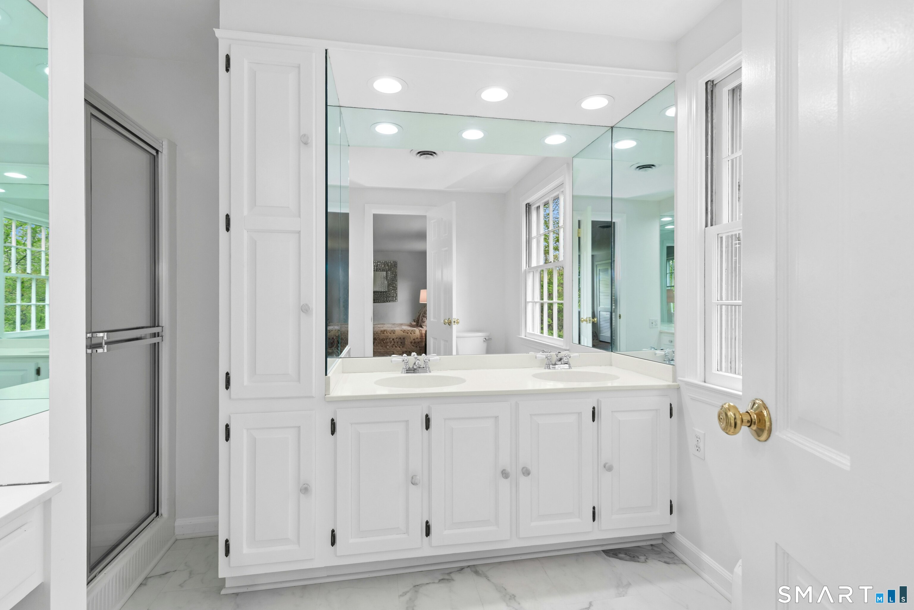 254 White Oak Shade Road New Canaan, CT 06840 - Photo 23 of 31 a bathroom with a sink vanity and mirror