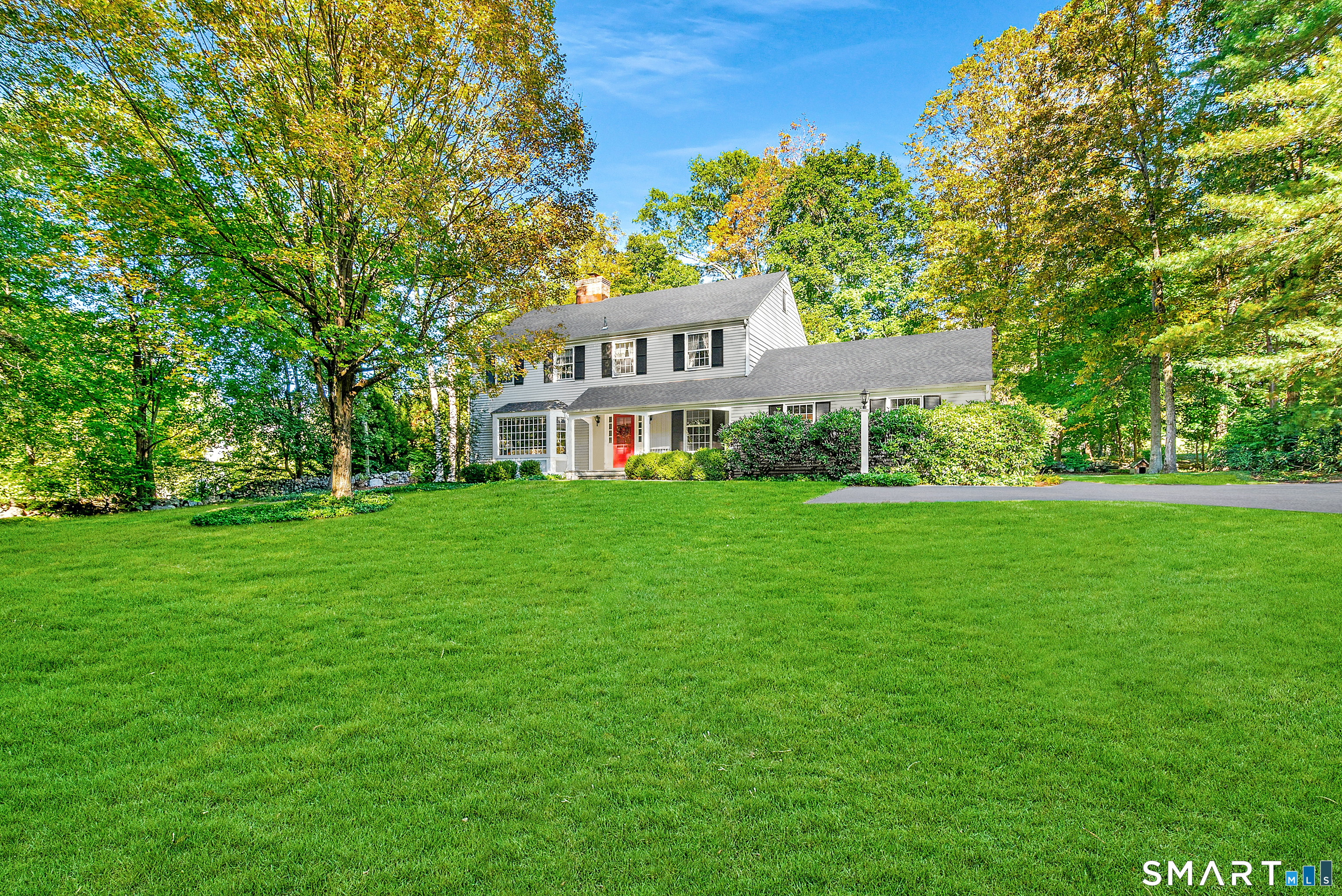 254 White Oak Shade Road New Canaan, CT 06840 - Photo 3 of 31 a view of a house with a big yard