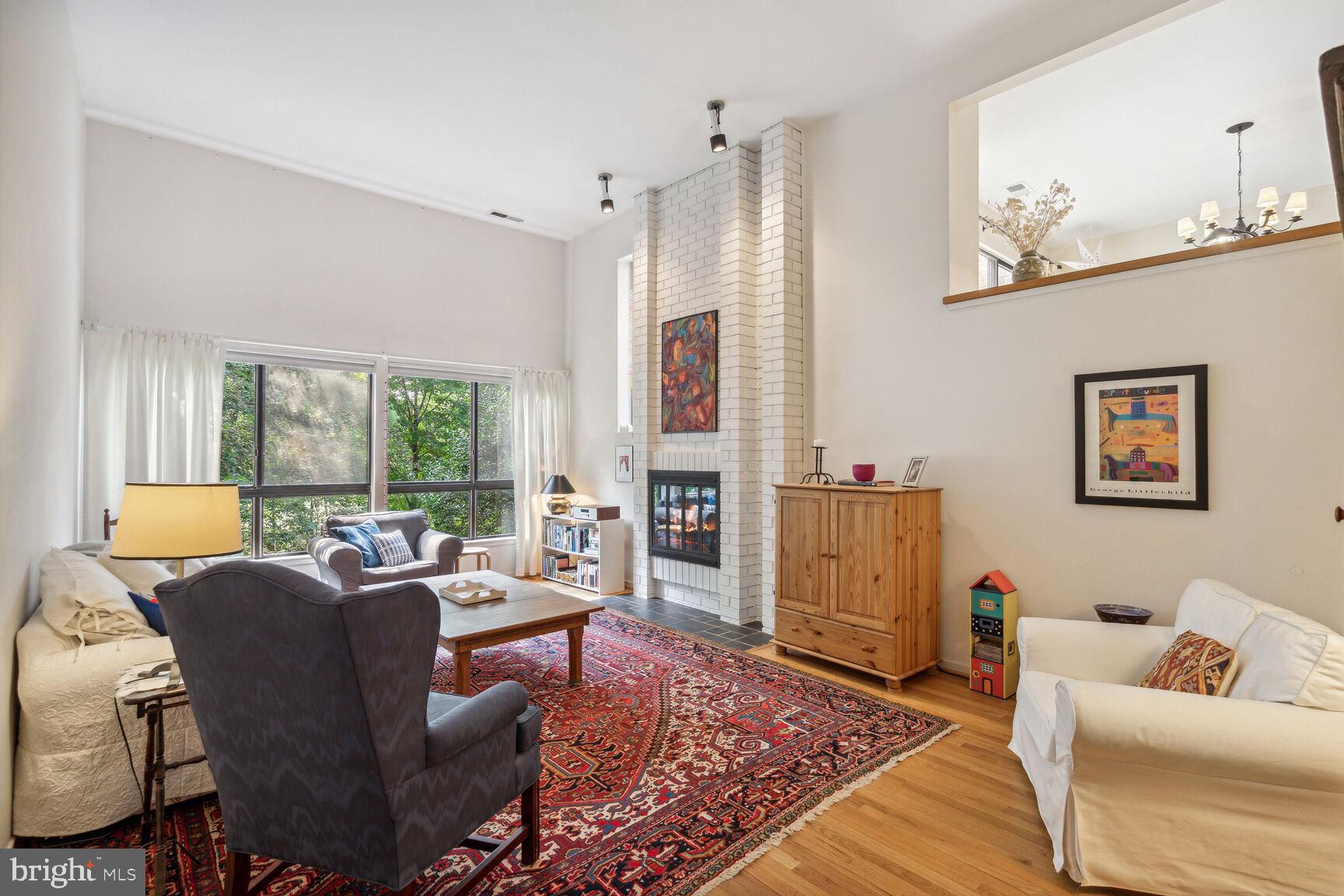 11617 Hunters Green Court Reston, VA 20191 - Photo 15 of 37 Living Room with Fireplace and Vaulted Ceilings