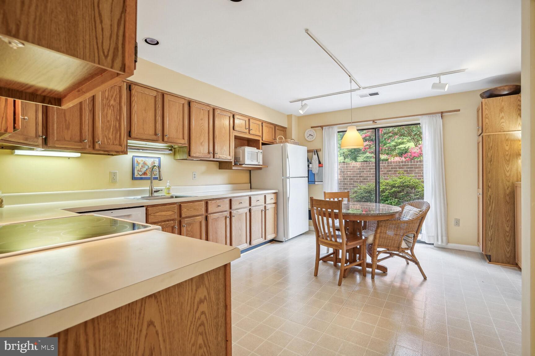 11617 Hunters Green Court Reston, VA 20191 - Photo 4 of 37 Sliding Glass Doors Lead to Private Front Patio