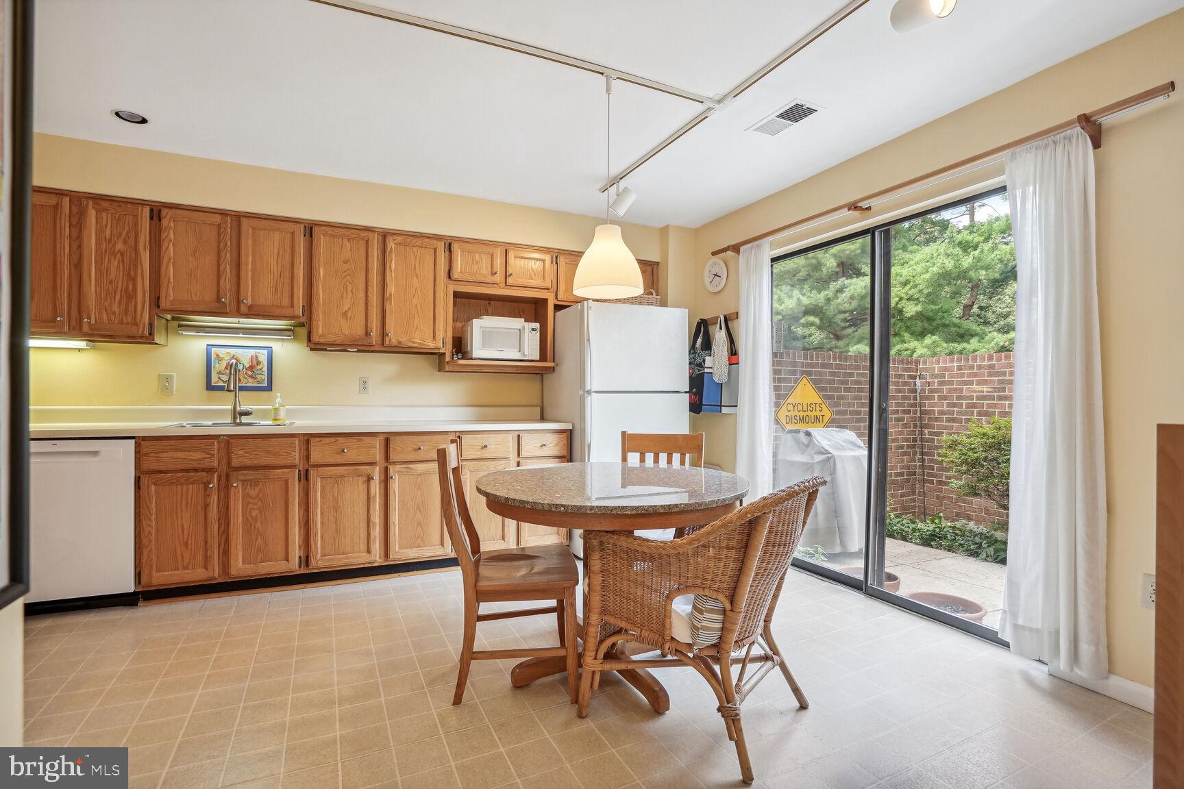 11617 Hunters Green Court Reston, VA 20191 - Photo 5 of 37 Enjoy the Sunrise in the Mornings during Breakfast