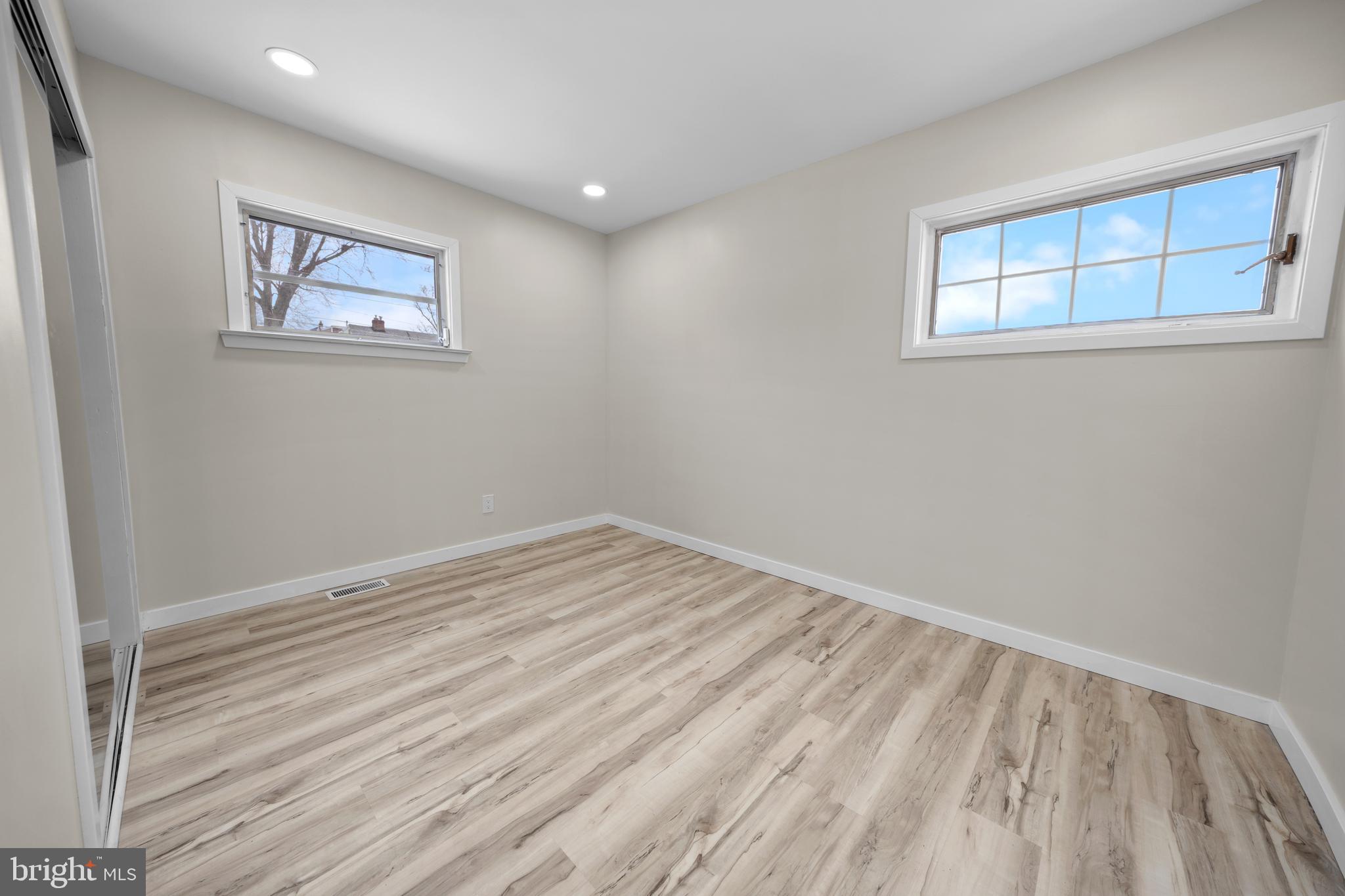 727 Sherrie Road Philadelphia, PA 19115 - Photo 14 of 18 a view of empty room with wooden floor and fan