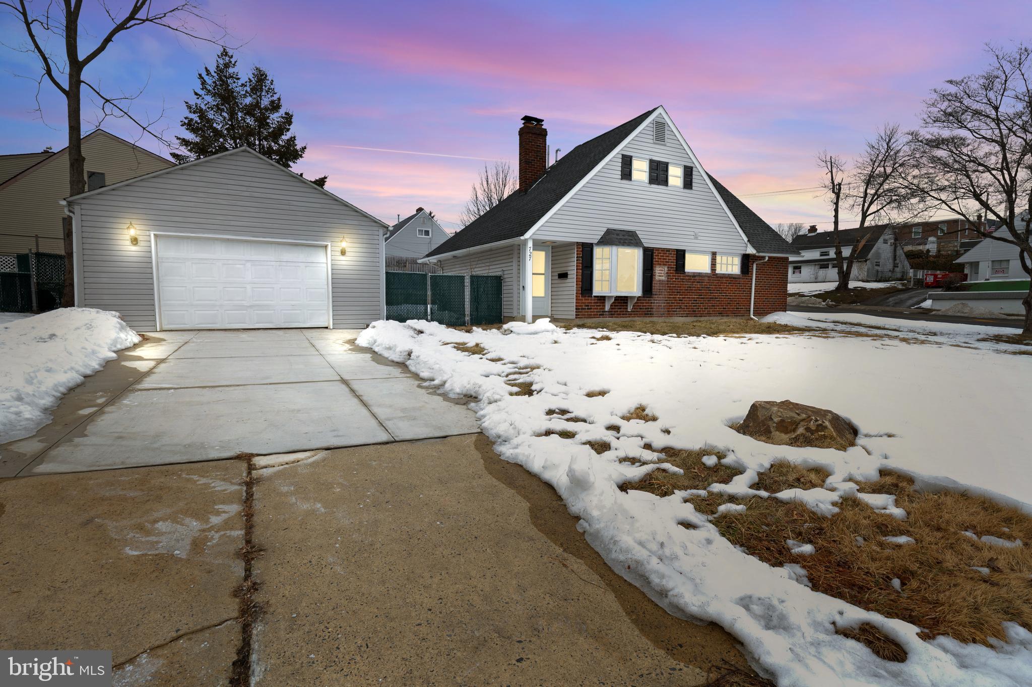 727 Sherrie Road Philadelphia, PA 19115 - Photo 18 of 18 a front view of a house with a yard