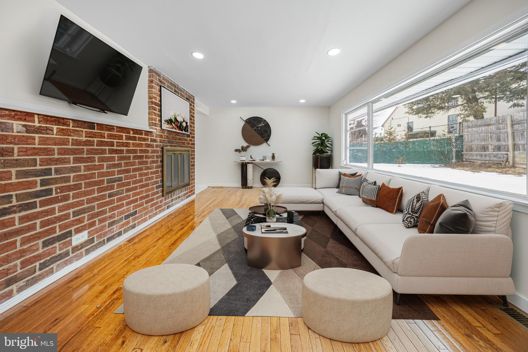 727 Sherrie Road Philadelphia, PA 19115 - Photo 9 of 18 a living room with furniture and a flat screen tv