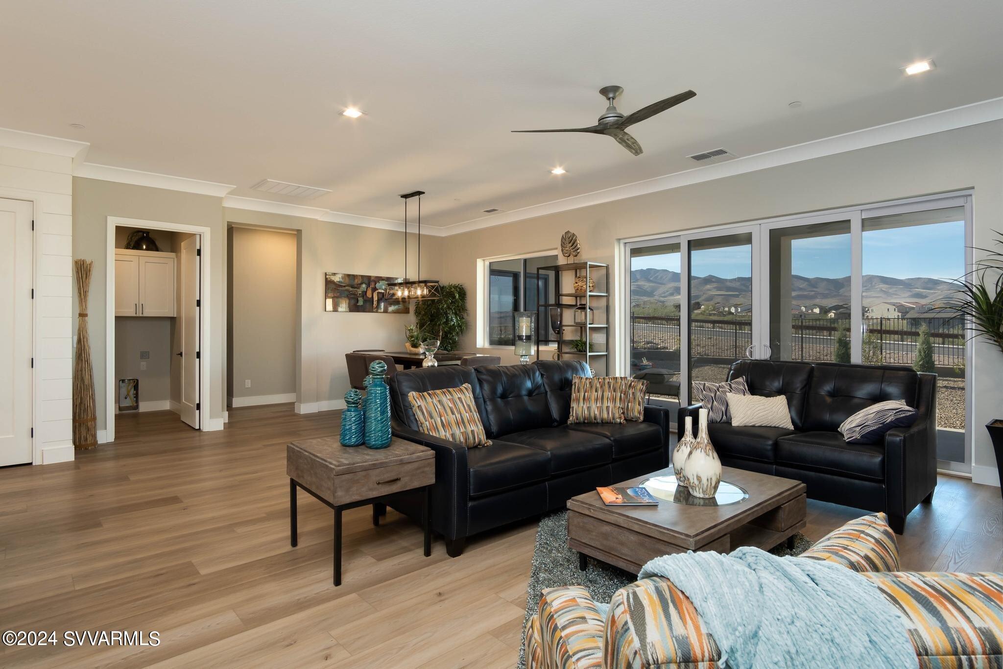 699 Moore Gulch Road, Unit LOT 117 Clarkdale, AZ 86324 - Photo 14 of 81 a living room with furniture and a large window
