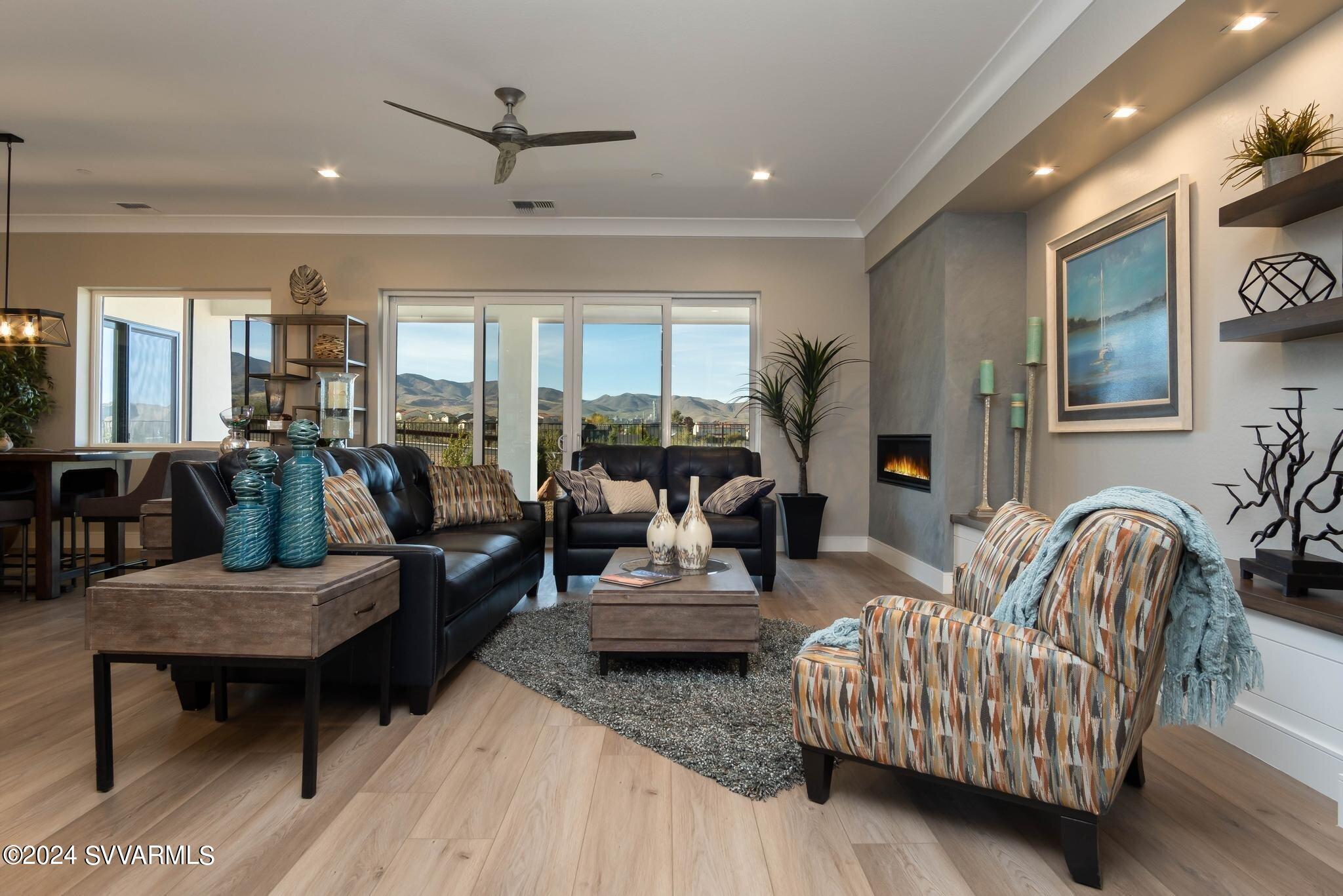 699 Moore Gulch Road, Unit LOT 117 Clarkdale, AZ 86324 - Photo 16 of 81 a living room with furniture and a large window