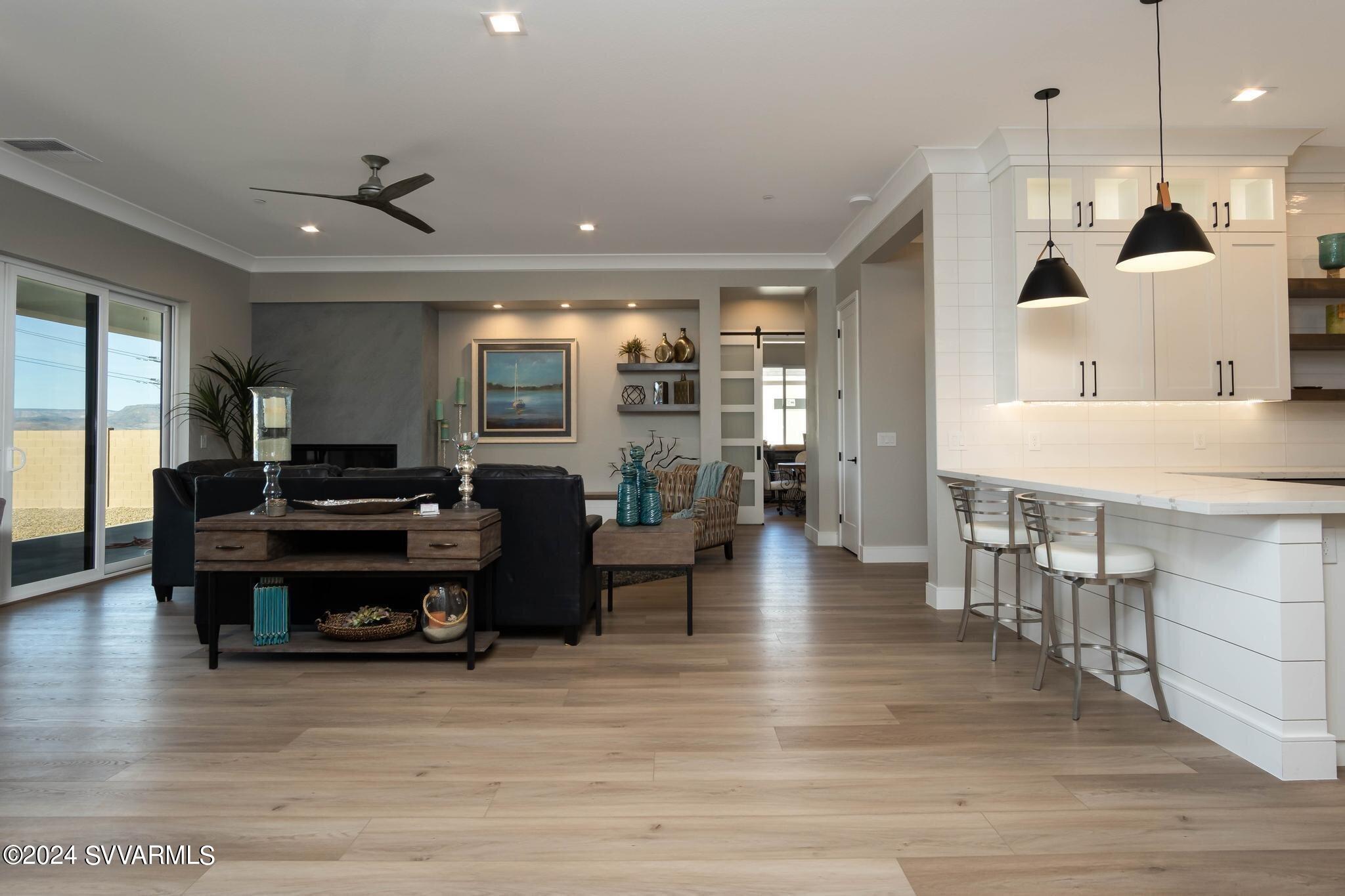 699 Moore Gulch Road, Unit LOT 117 Clarkdale, AZ 86324 - Photo 17 of 81 a living room with furniture and wooden floor