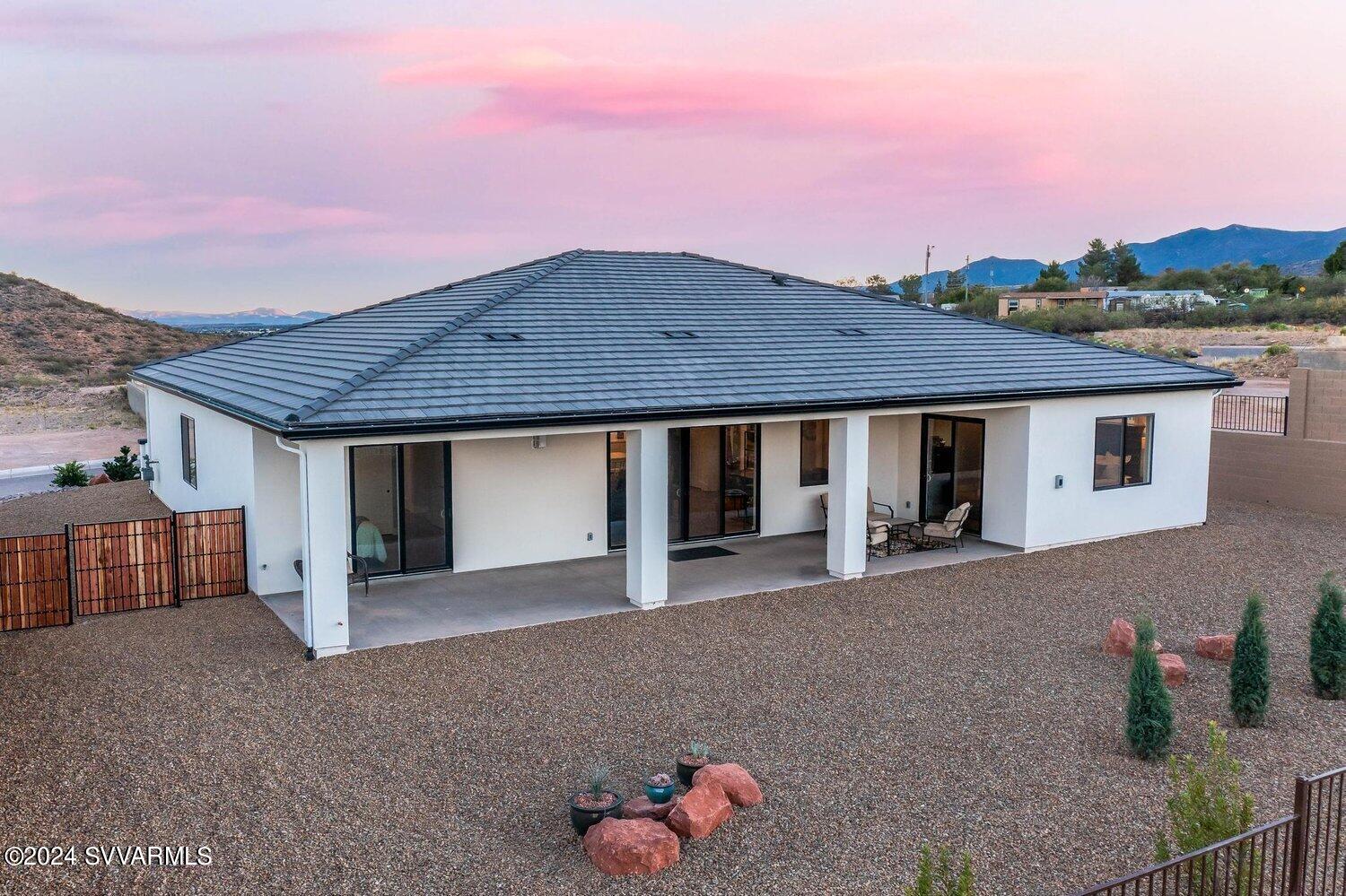 699 Moore Gulch Road, Unit LOT 117 Clarkdale, AZ 86324 - Photo 2 of 81 front view of a house with a porch