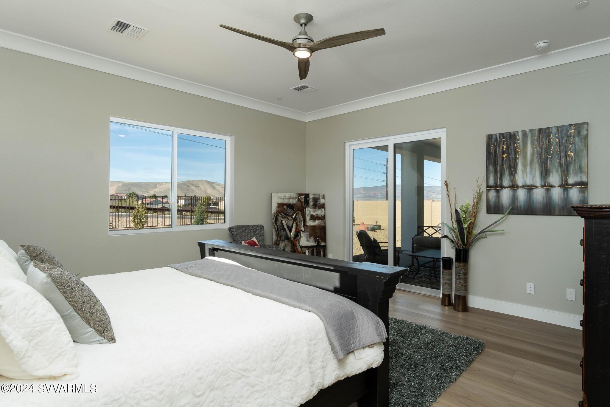 699 Moore Gulch Road, Unit LOT 117 Clarkdale, AZ 86324 - Photo 32 of 81 a bedroom with a bed and window