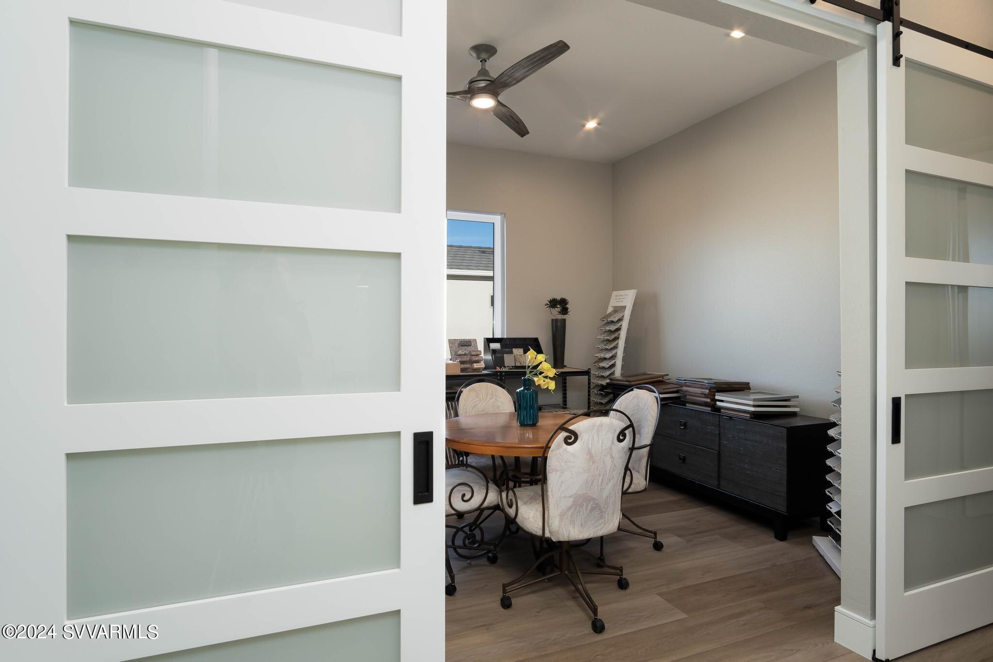 699 Moore Gulch Road, Unit LOT 117 Clarkdale, AZ 86324 - Photo 44 of 81 a workspace with furniture and wooden floor