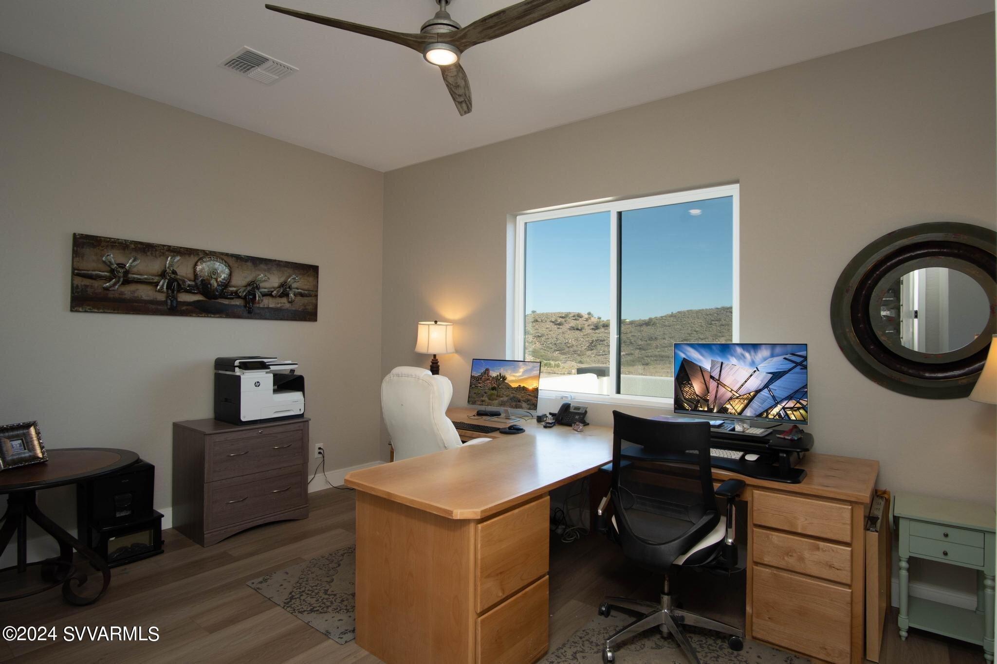 699 Moore Gulch Road, Unit LOT 117 Clarkdale, AZ 86324 - Photo 45 of 81 a work room with furniture and a window