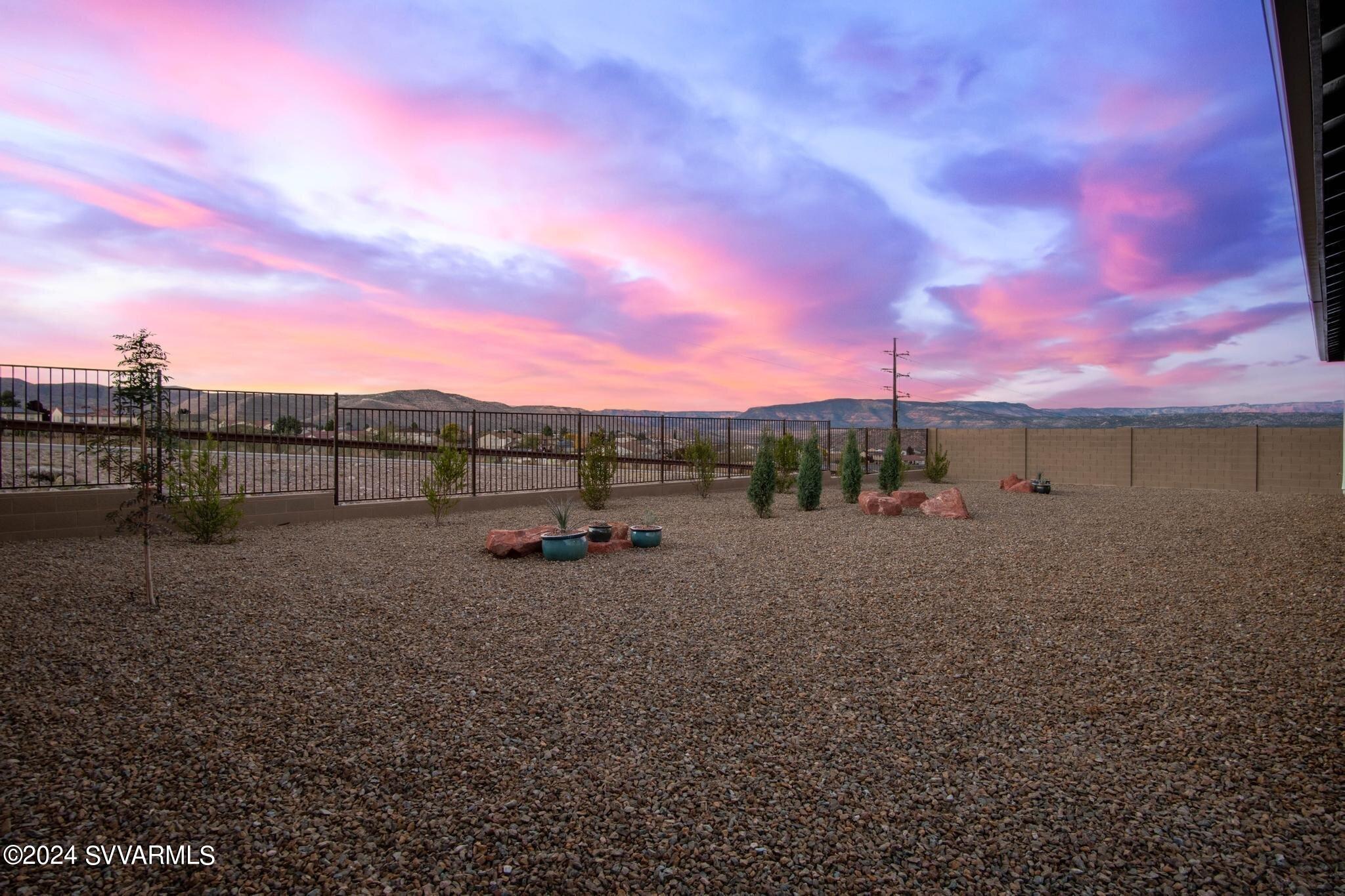 699 Moore Gulch Road, Unit LOT 117 Clarkdale, AZ 86324 - Photo 51 of 81 a view of a yard with a slide